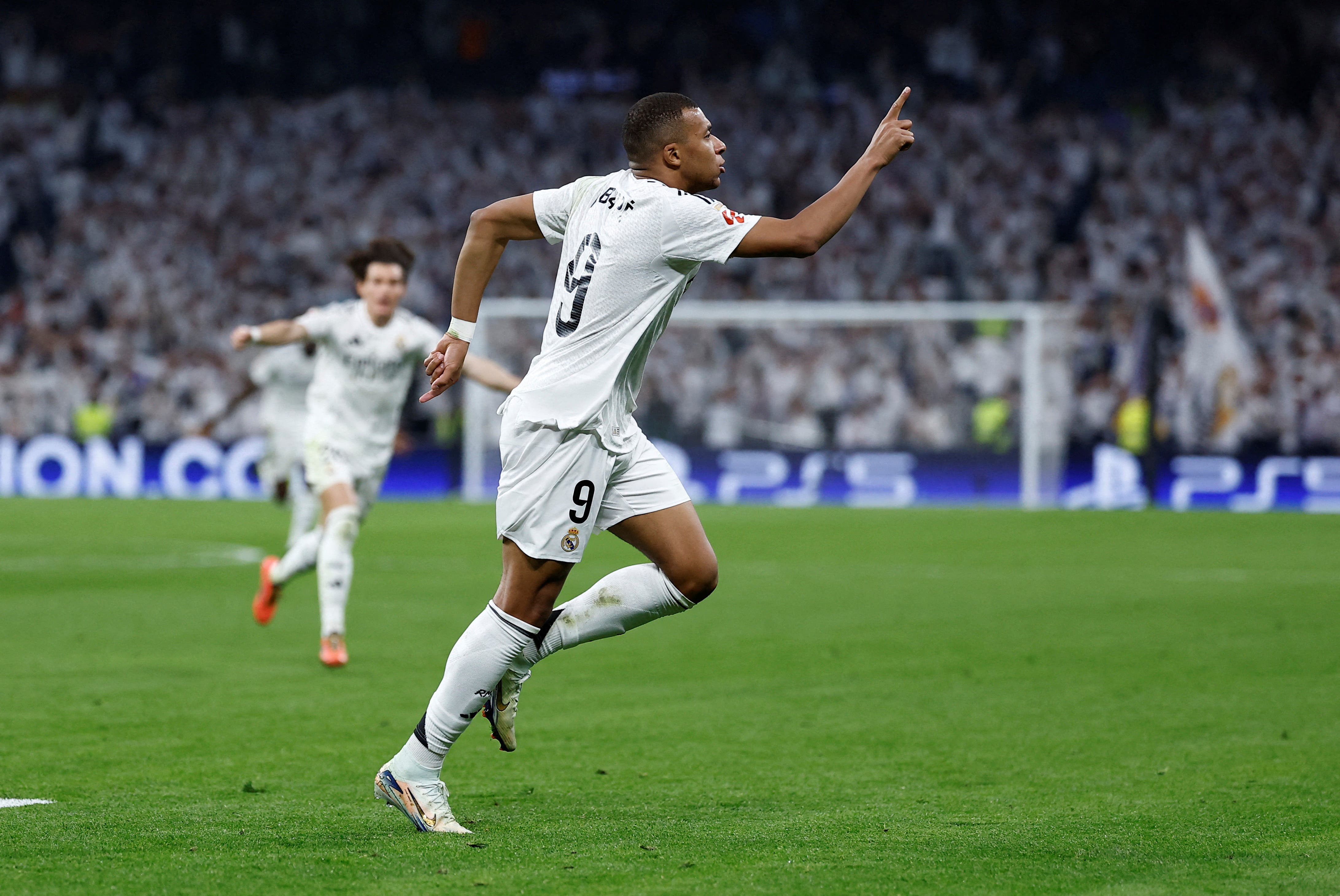 Mbappé playing for Real Madrid.