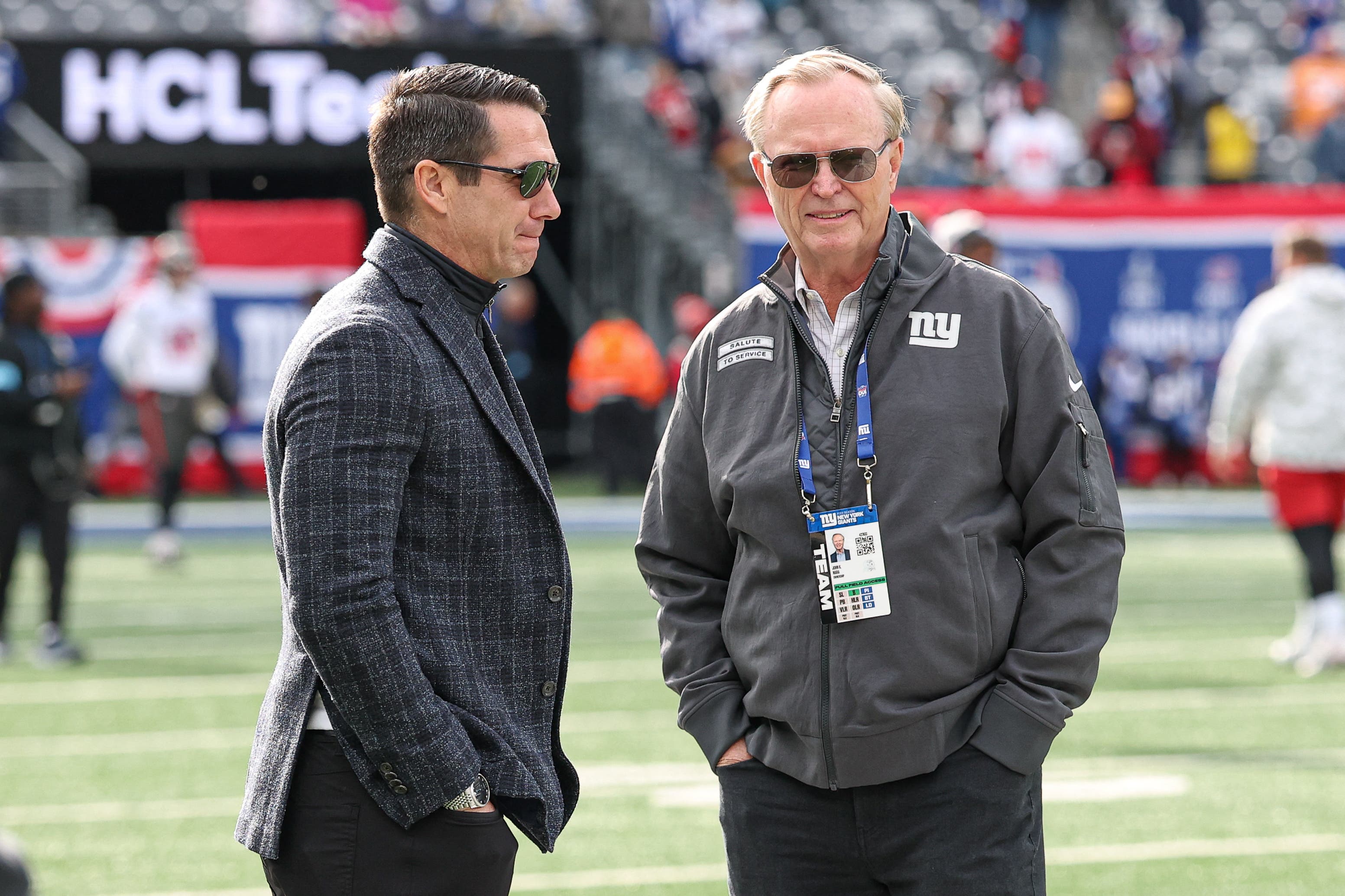 New York Giants owner John Mara, left, and New York Giants general manager Joe Schoen on the field before the game between the Giants and the Tampa Bay Buccaneers at MetLife Stadium