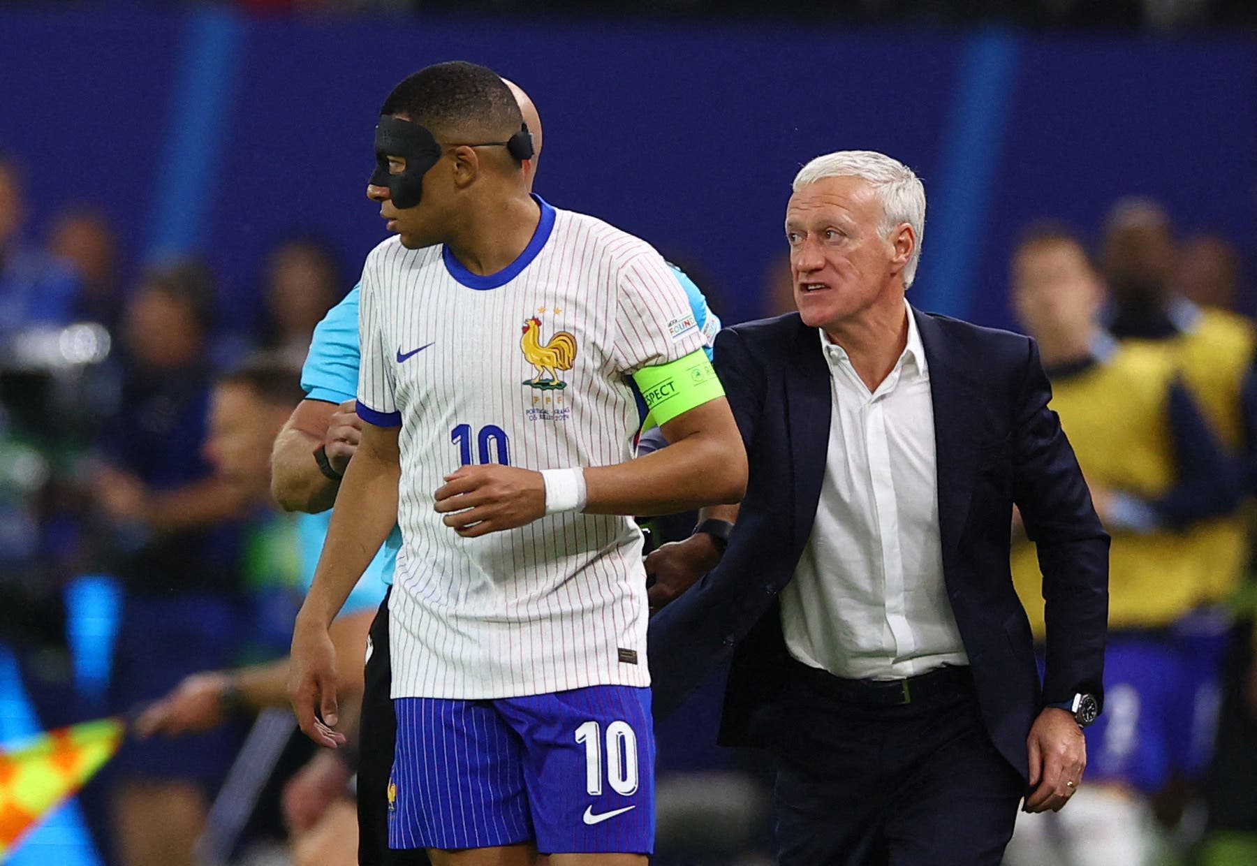 France's Kylian Mbappe with coach Didier Deschamps