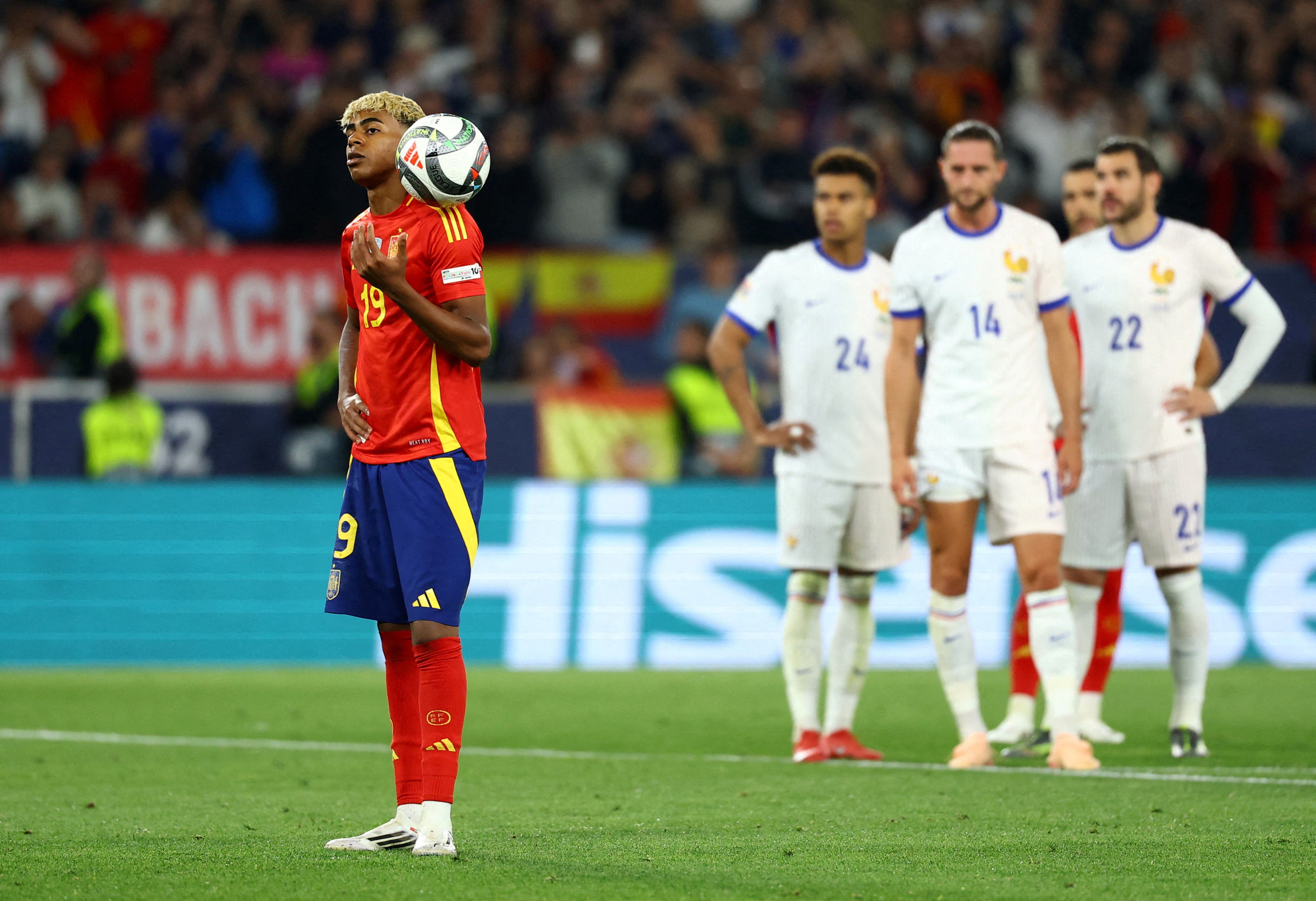 Spain's Lamine Yamal before taking the penalty 