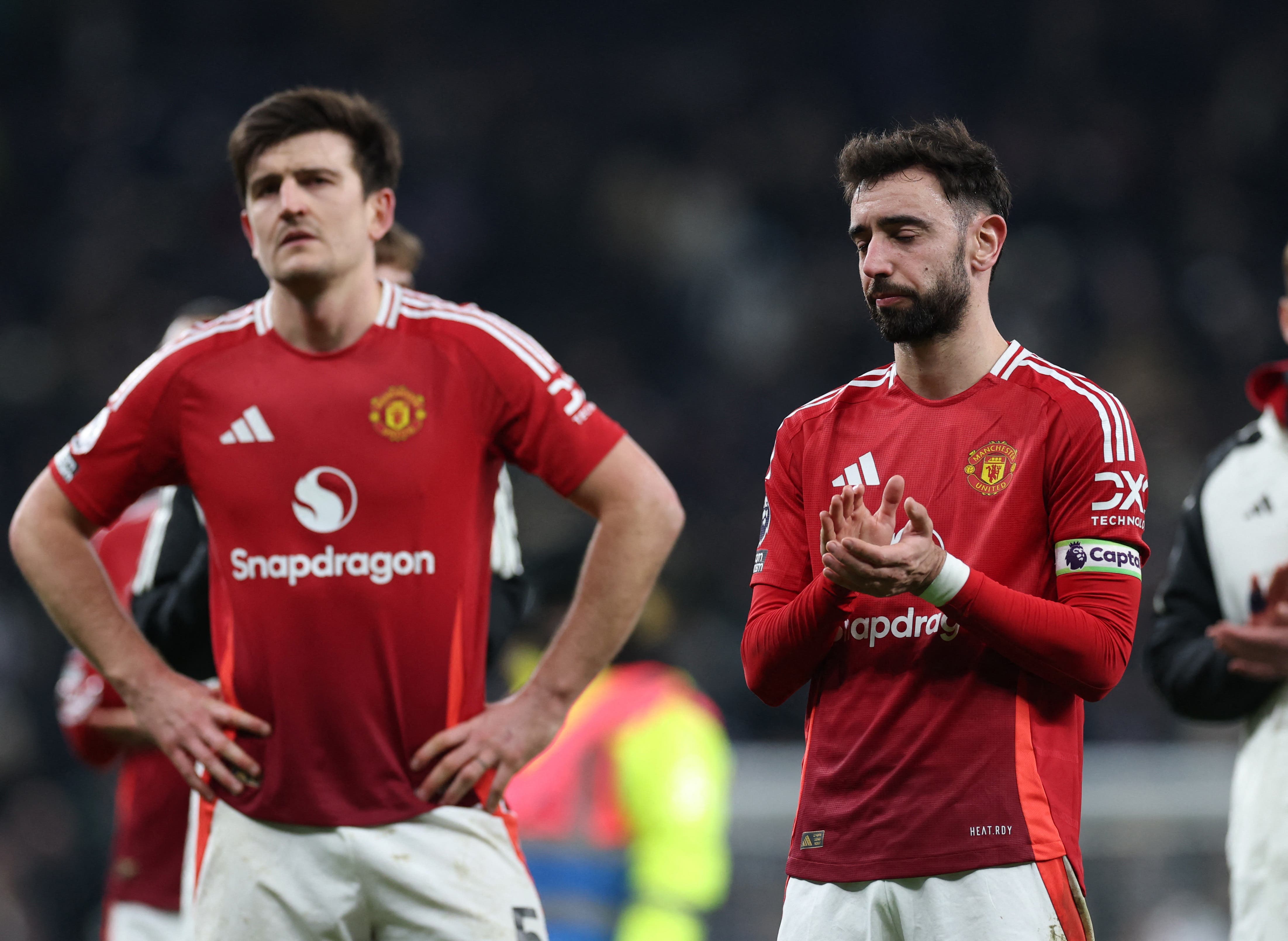 Manchester United's Harry Maguire and Bruno Fernandes look dejected after the match