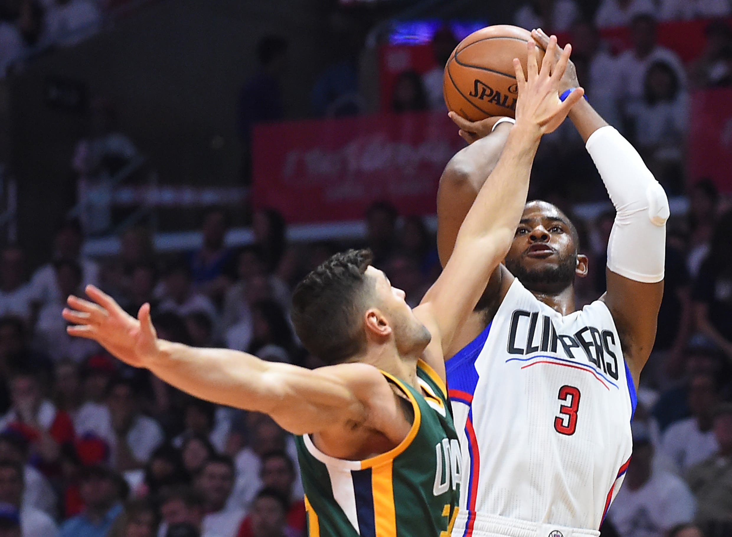 Apr 30, 2017; Los Angeles, CA, USA; Utah Jazz guard Raul Neto (25) defends a shot by Los Angeles Clippers guard Chris Paul (3) in the first half of game seven of the first round of the 2017 NBA Playoffs at Staples Center. Mandatory Credit: Jayne Kamin-Oncea-USA TODAY Sports
