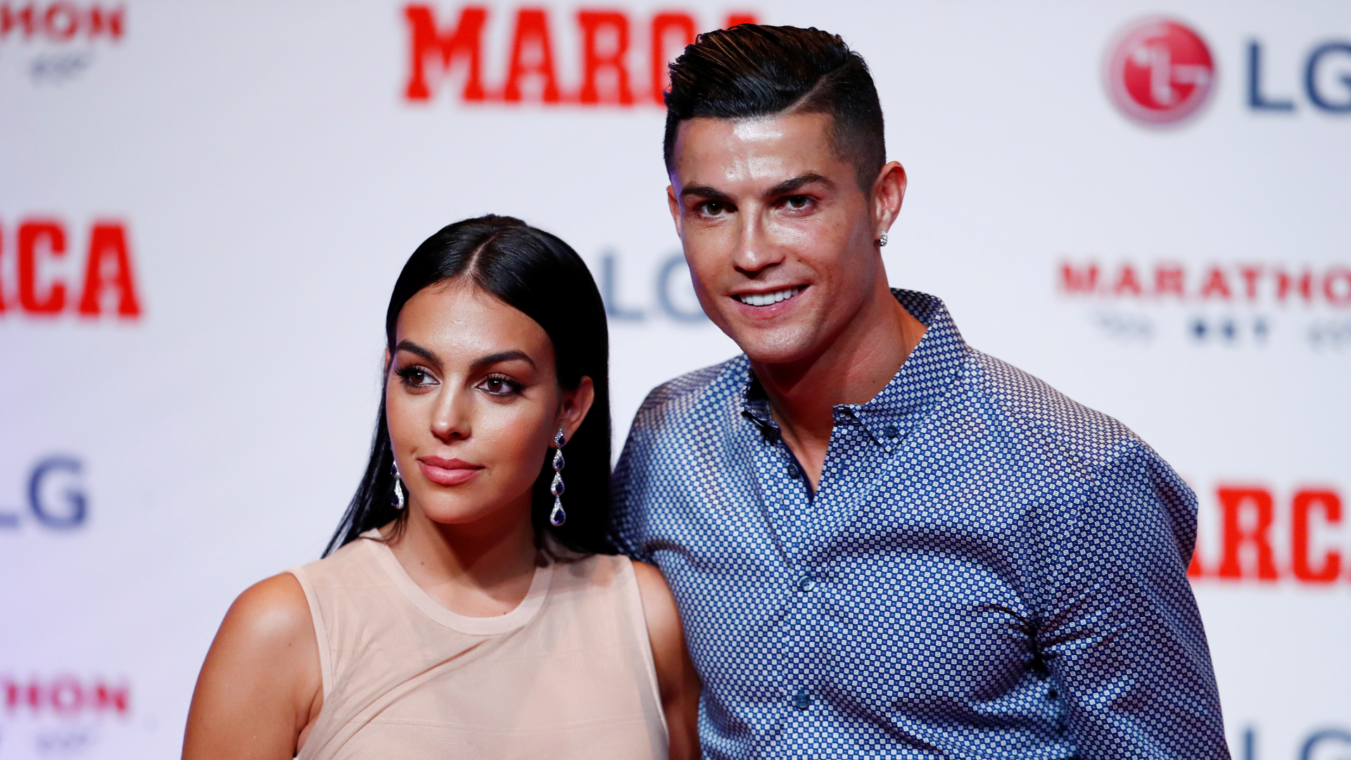 Cristiano Ronaldo and Georgina Rodríguez during an award ceremony.