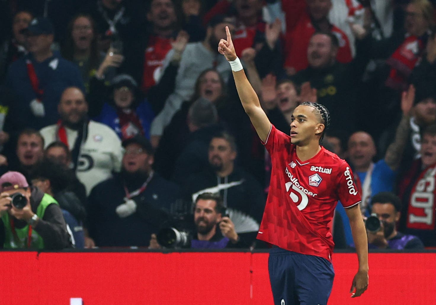 Soccer Football - Ligue 1 - Lille v Paris St Germain - Decathlon Arena Stade Pierre-Mauroy, Villeneuve-d'Ascq, France - October 5, 2025 Lille's Ethan Mbappe celebrates scoring their first goal REUTERS/Gonzalo Fuentes