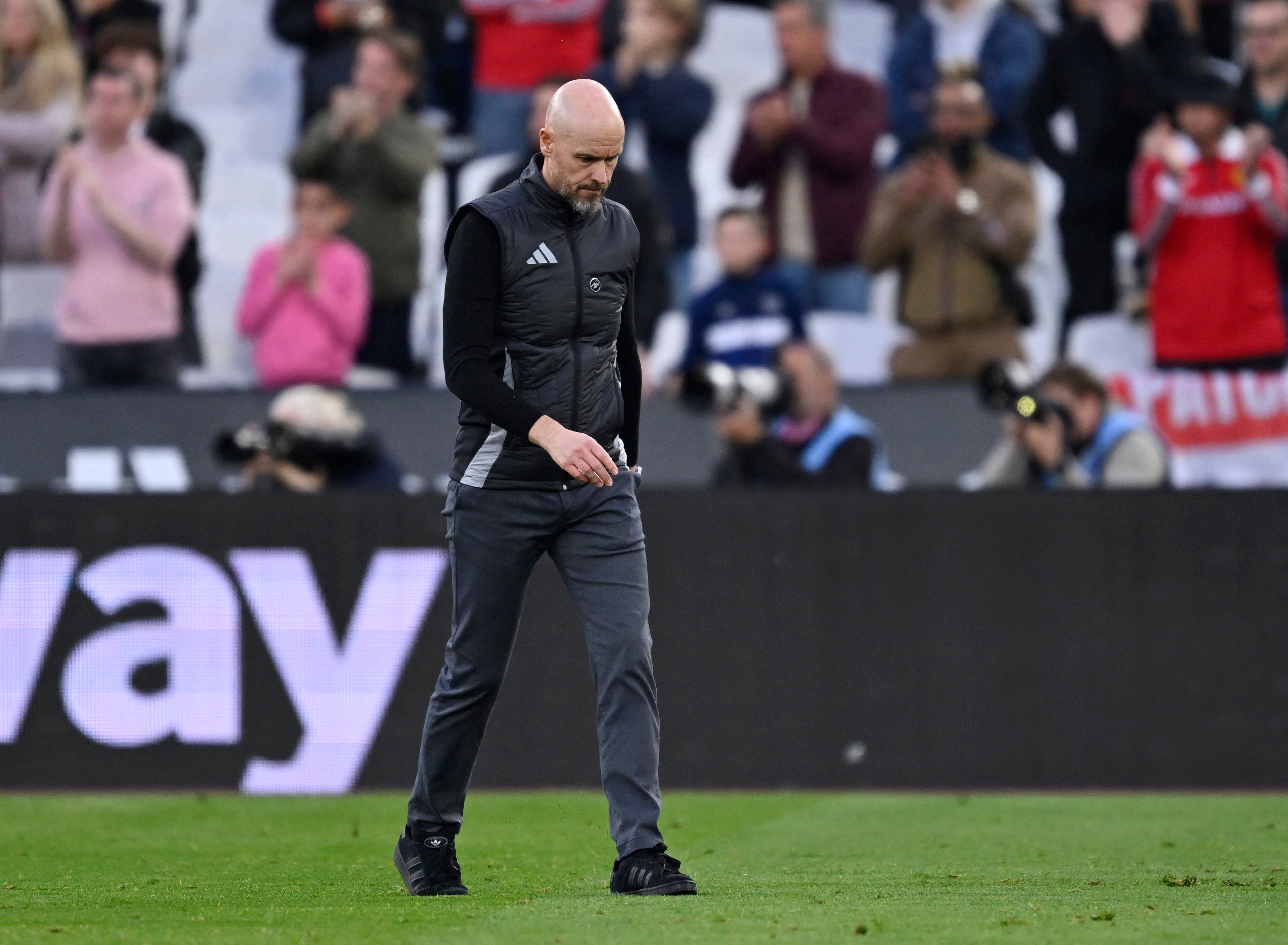 Manchester United manager Erik ten Hag looks dejected