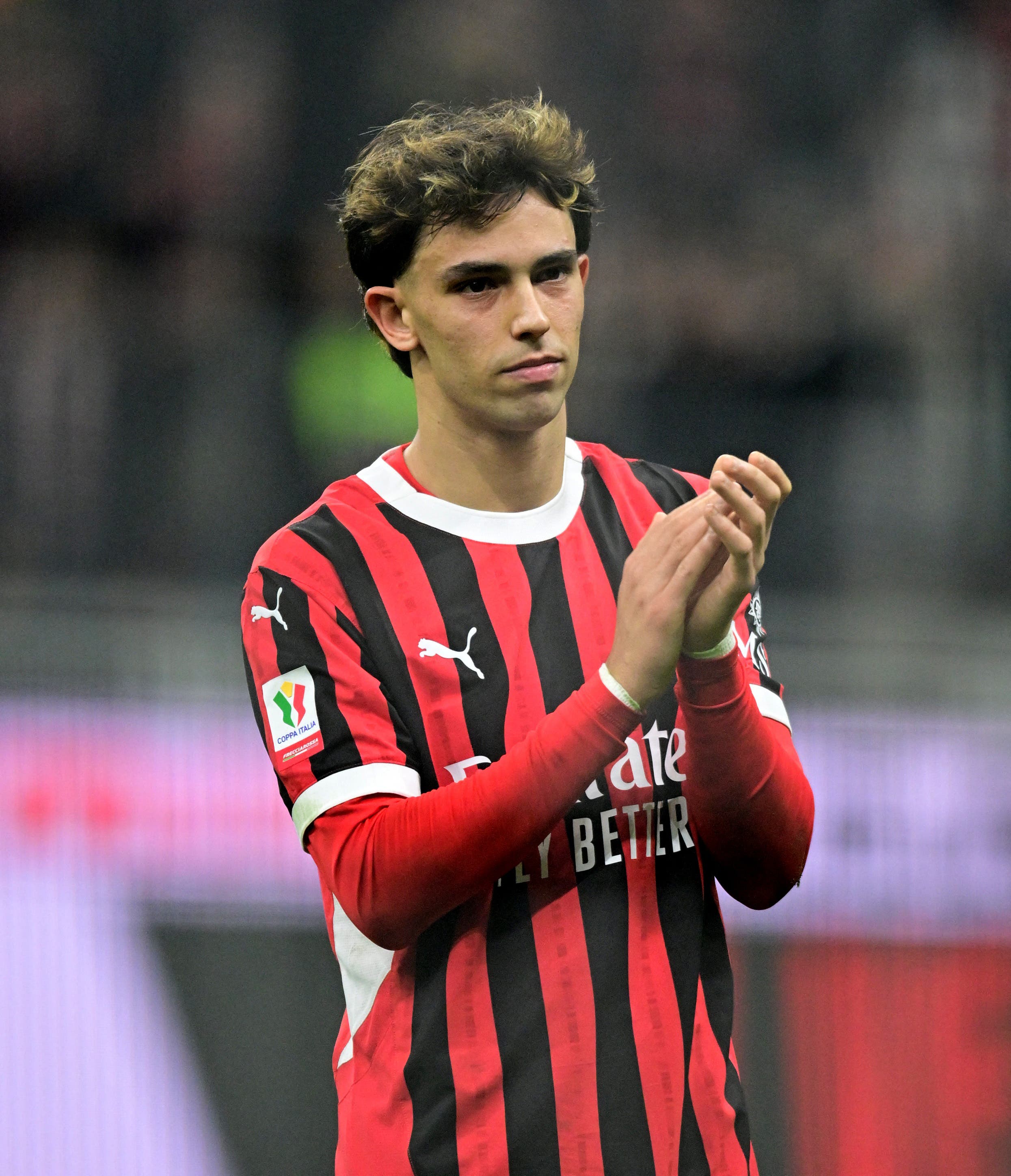 AC Milan's Joao Felix celebrates after the match