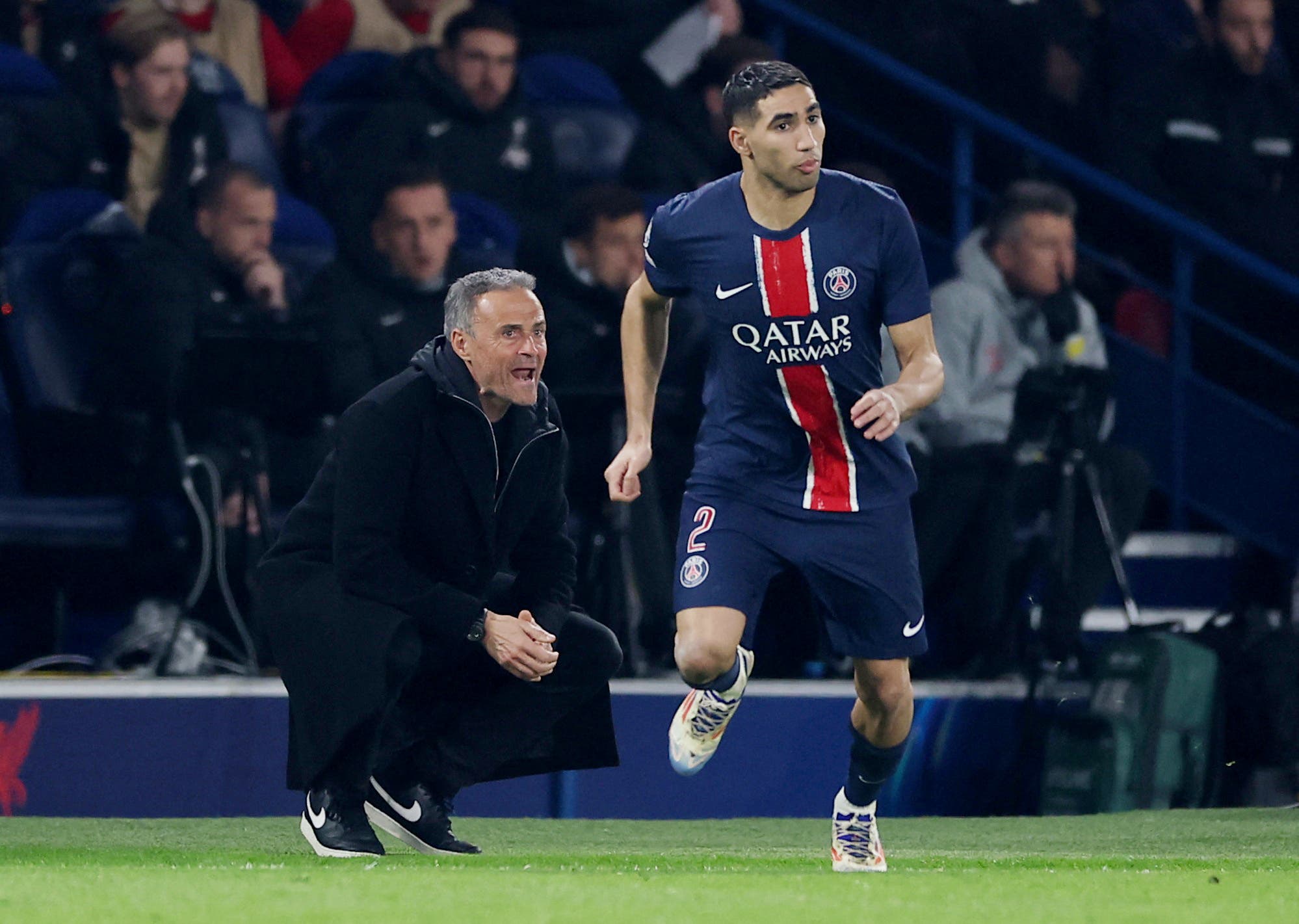 Paris St Germain coach Luis Enrique and Achraf Hakimi 