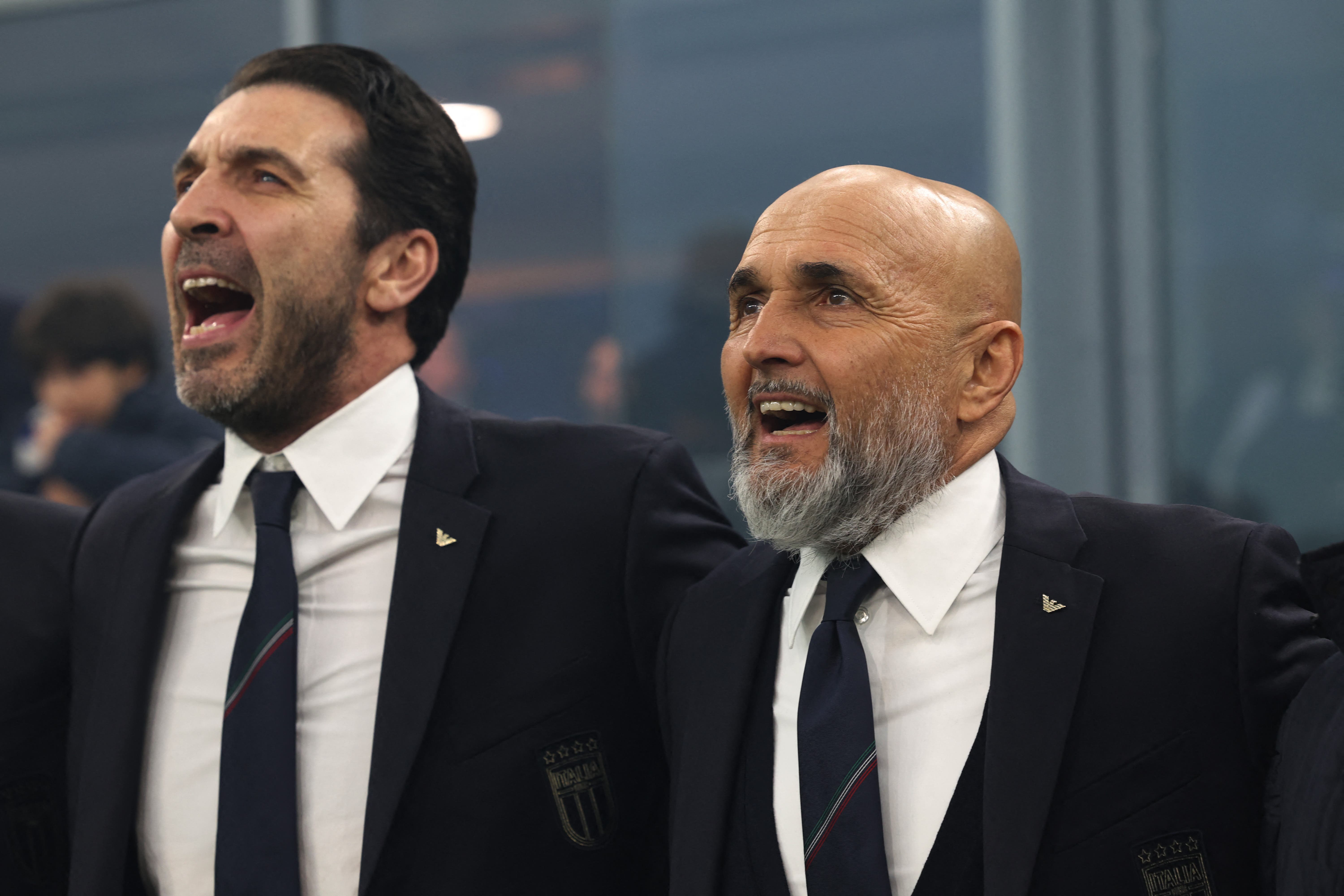 Soccer Football - Nations League - Quarter Final - First Leg - Italy v Germany - San Siro, Milan, Italy - March 20, 2025 Head of Italy delegation Gianluigi Buffon and Italy coach Luciano Spalletti during the national anthem before the match REUTERS/Claudia Greco