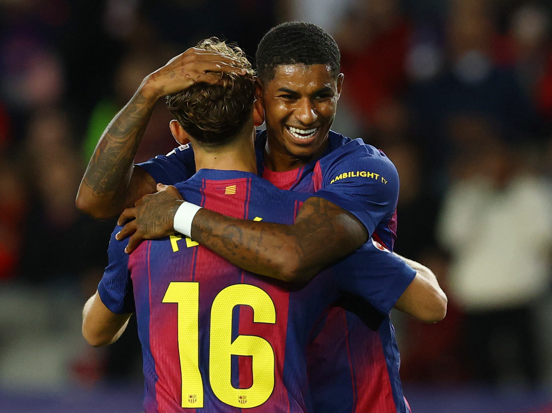 Soccer Football - LaLiga - FC Barcelona v Elche - Estadi Olimpic Lluis Companys, Barcelona, Spain - November 2, 2025 FC Barcelona's Marcus Rashford celebrates scoring their third goal with Fermin Lopez REUTERS/Albert Gea
