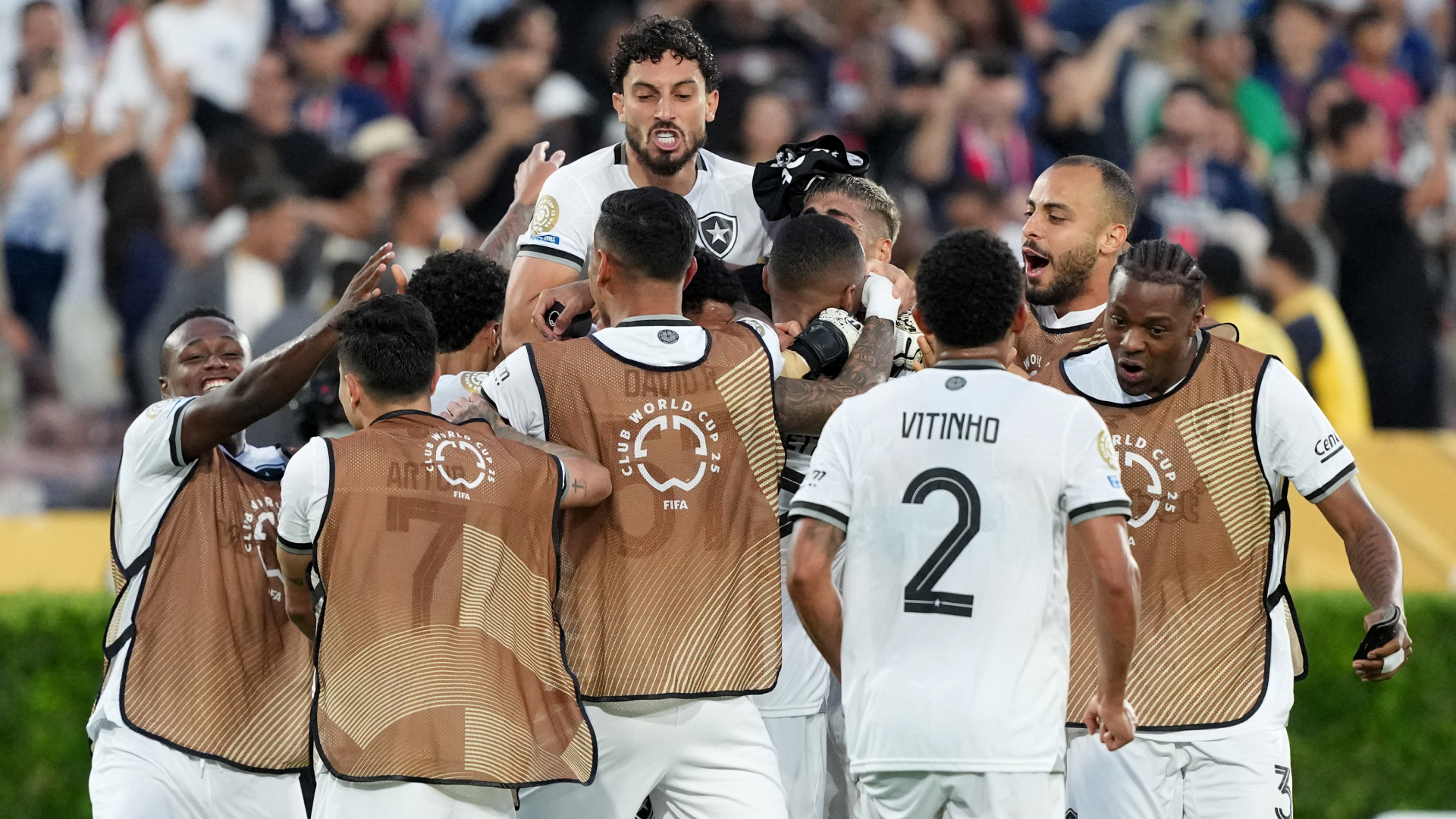 Botafofo players celebrate after defeating Paris Saint-Germain in the Club World Cup.