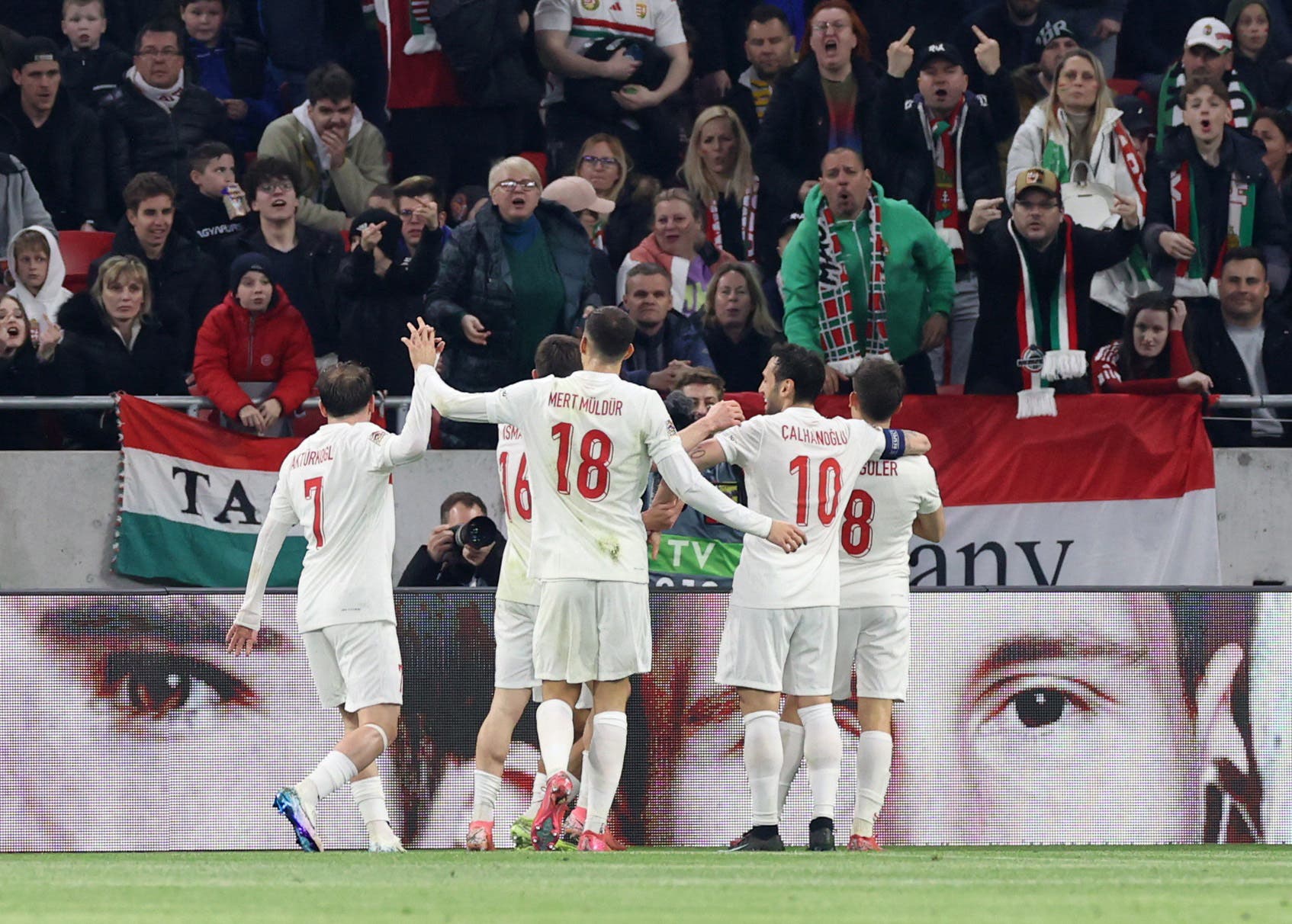 Soccer Football - Nations League - Play-offs - Second Leg - Hungary v Turkey - Puskas Arena, Budapest, Hungary - March 23, 2025 Turkey's Arda Guler celebrates scoring their second goal with teammates REUTERS/Bernadett Szabo