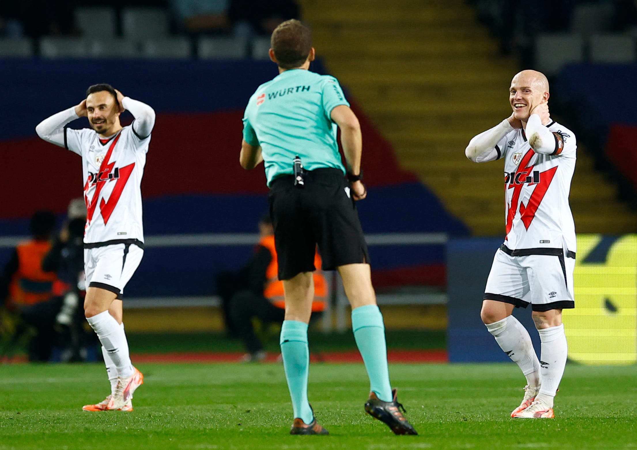 Rayo Vallecano's Isi Palazon and Rayo Vallecano's Alvaro Garcia reacts after missing a chance to score 