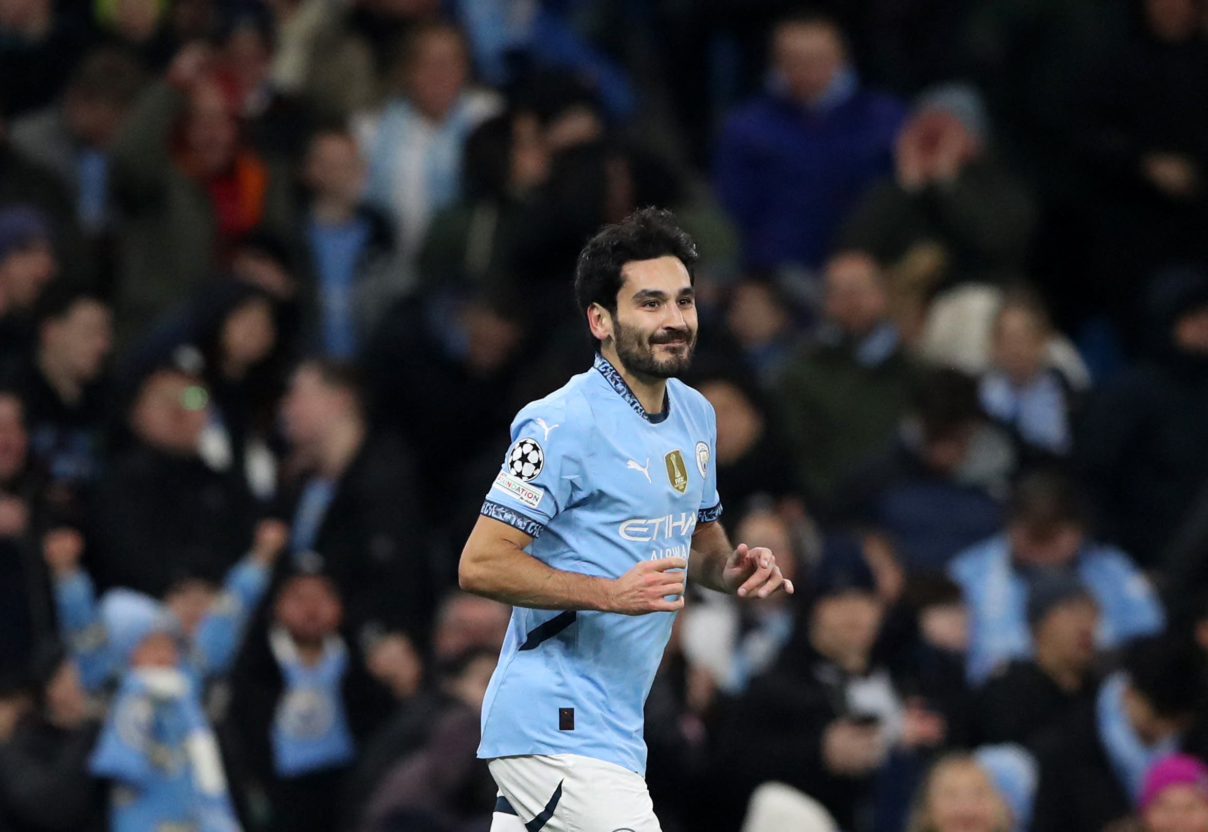 Manchester City's Ilkay Gundogan reacts after scoring