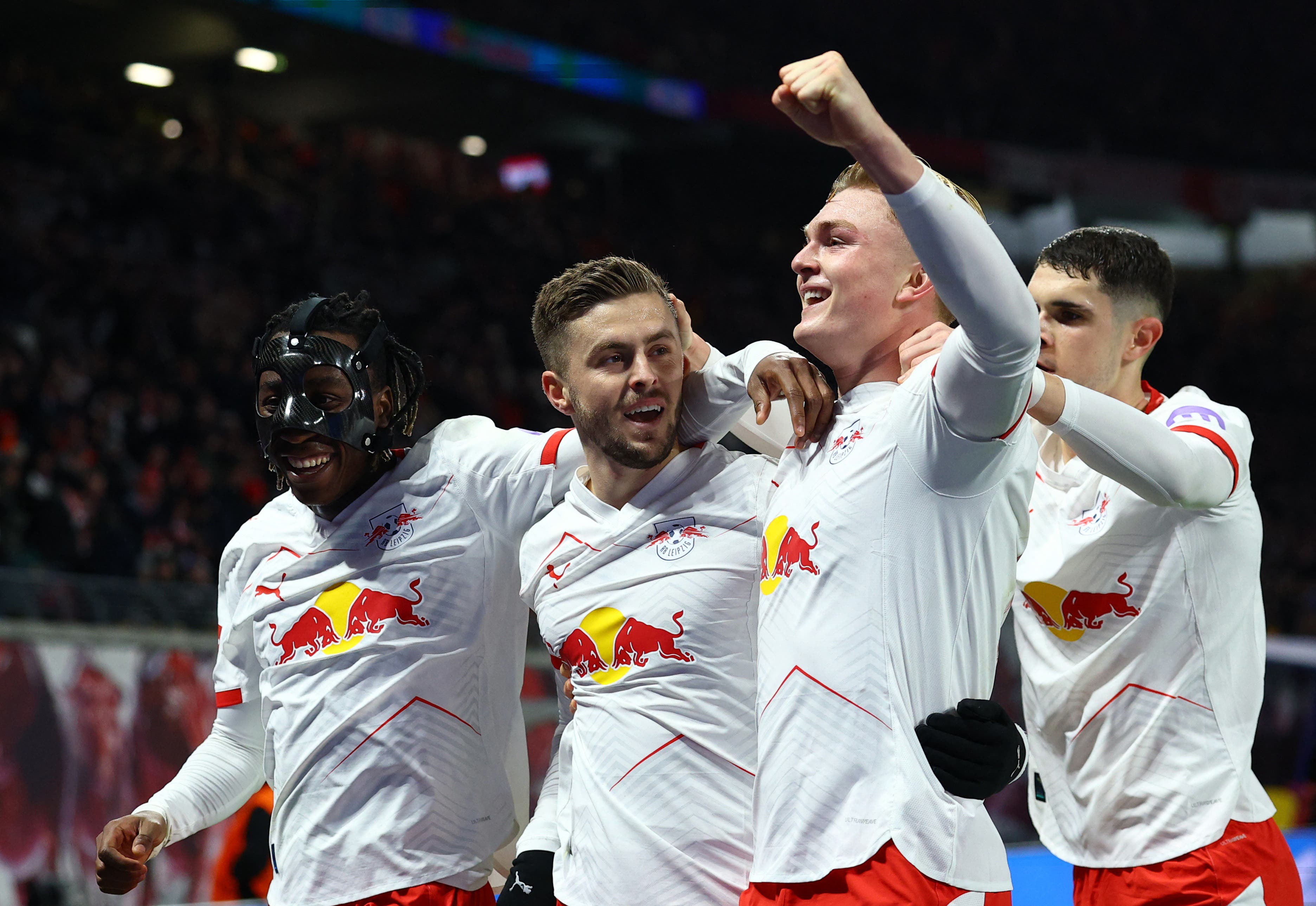 Soccer Football - Bundesliga - RB Leipzig v Eintracht Frankfurt - Red Bull Arena, Leipzig, Germany - December 6, 2025 RB Leipzig's Christoph Baumgartner celebrates scoring their second goal with Yan Diomande, Conrad Harder and Kosta Nedeljkovic REUTERS/Lisi Niesner