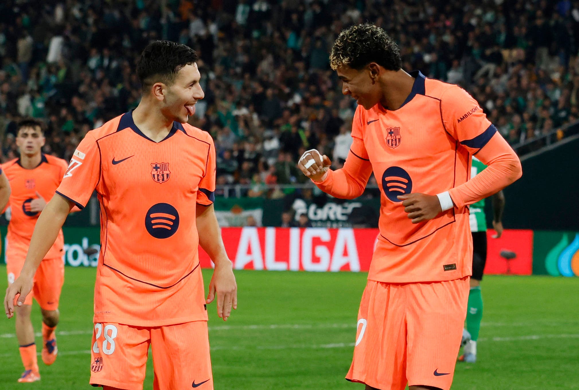 Soccer Football - LaLiga - Real Betis v FC Barcelona - Estadio Benito Villamarin, Seville, Spain - December 6, 2025 FC Barcelona's Lamine Yamal celebrates scoring their fifth goal with Roony Bardghji REUTERS/Marcelo Del Pozo