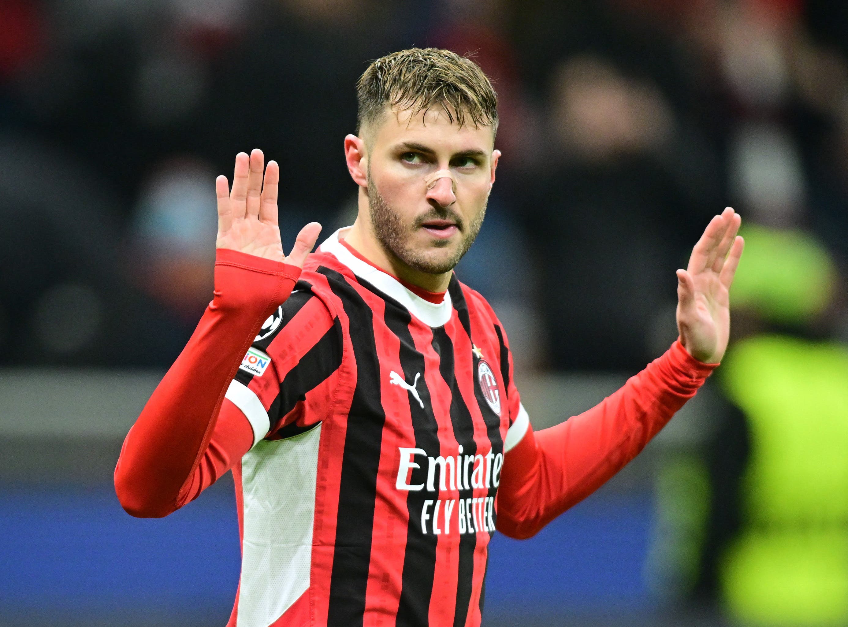 AC Milan's Santiago Gimenez celebrates scoring their first goal