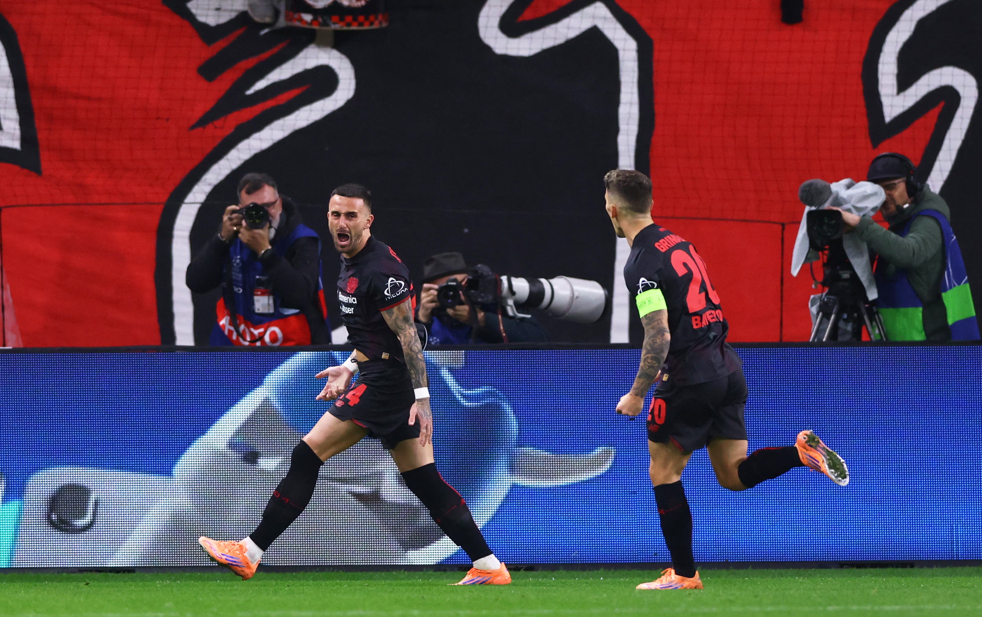 Soccer Football - UEFA Champions League - Bayer Leverkusen v Paris St Germain - BayArena, Leverkusen, Germany - October 21, 2025 Bayer Leverkusen's Aleix Garcia celebrates scoring their first goal REUTERS/Thilo Schmuelgen