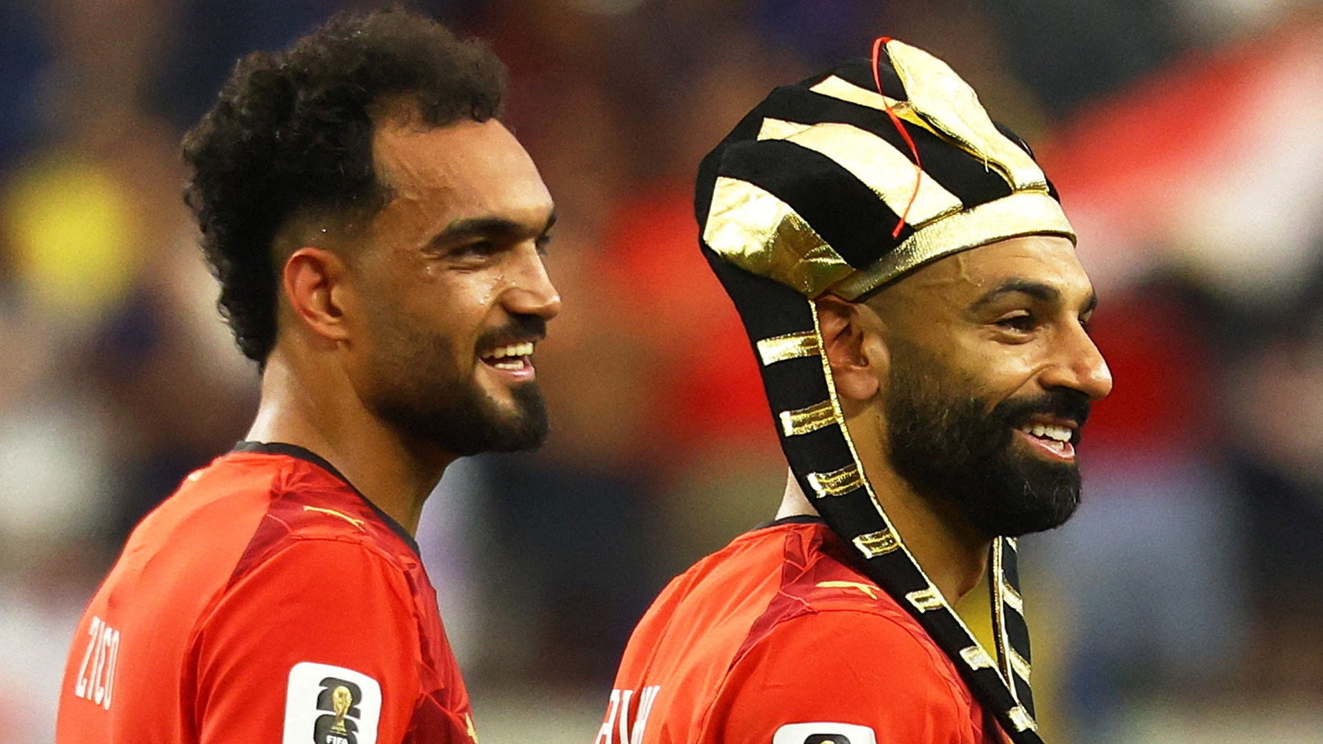 Soccer Football - FIFA World Cup 2026 - Round of 32 - Australia v Egypt - Dallas Stadium, Arlington, Texas, U.S. - July 3, 2026 Egypt's Mostafa Zico and Mohamed Salah celebrate after the match as Egypt qualify for the Round of 16 stage of the World Cup REUTERS/Kai Pfaffenbach TPX IMAGES OF THE DAY