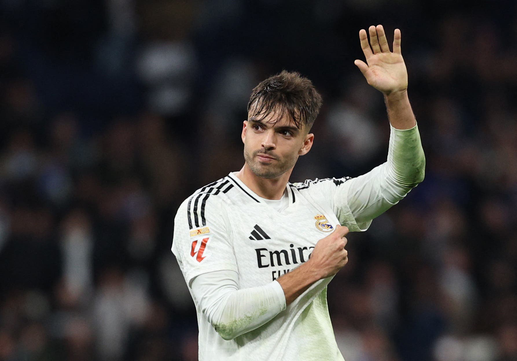 Real Madrid's Raul Asencio reacts at the end of the match