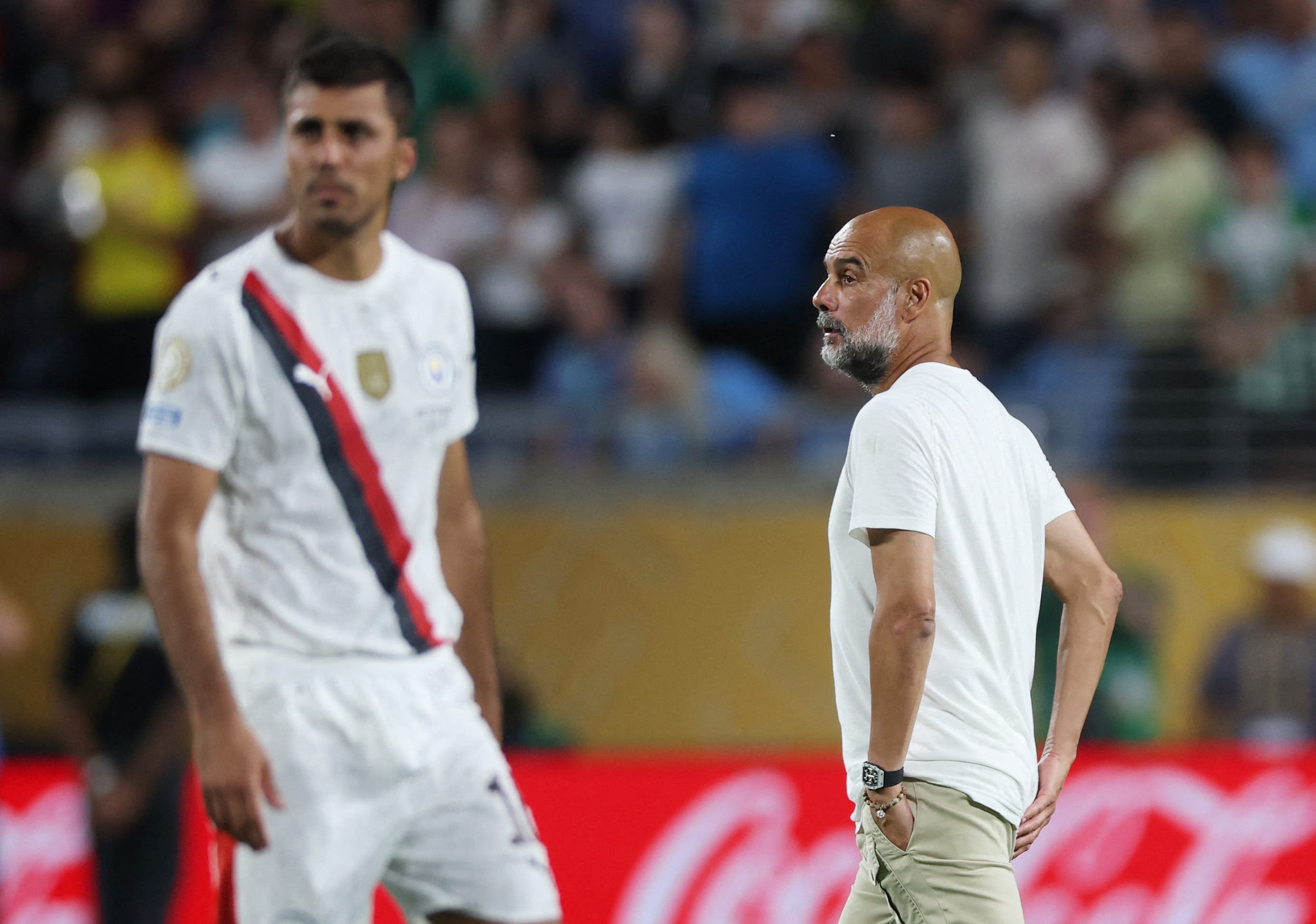 Manchester City manager Pep Guardiola looks dejected after the match