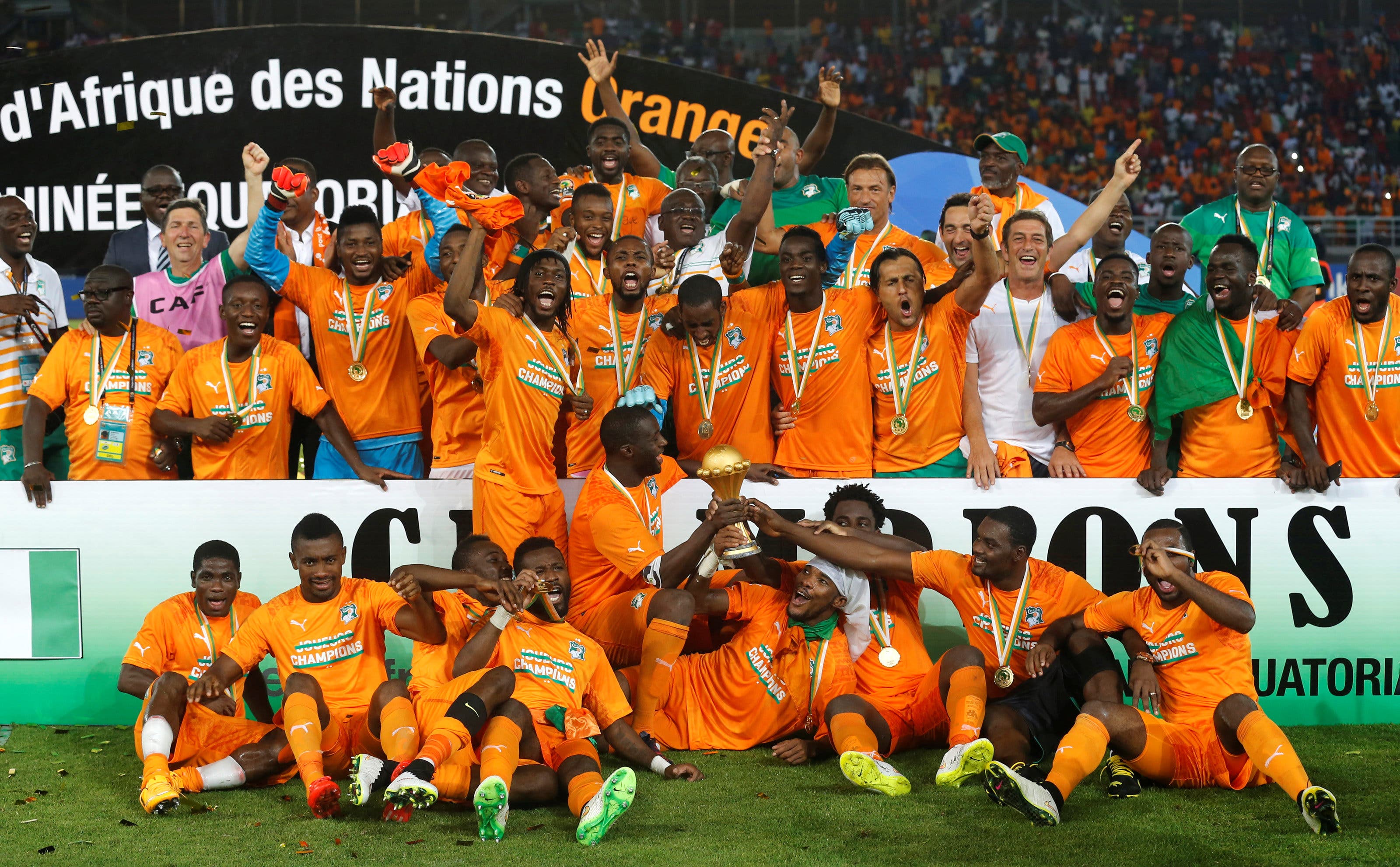 FILE PHOTO: Ivory Coast's players celebrate with the trophy after winning the African Nations Cup final soccer match against Ghana in Bata, February 8, 2015. REUTERS/Amr Abdallah Dalsh/File Photo