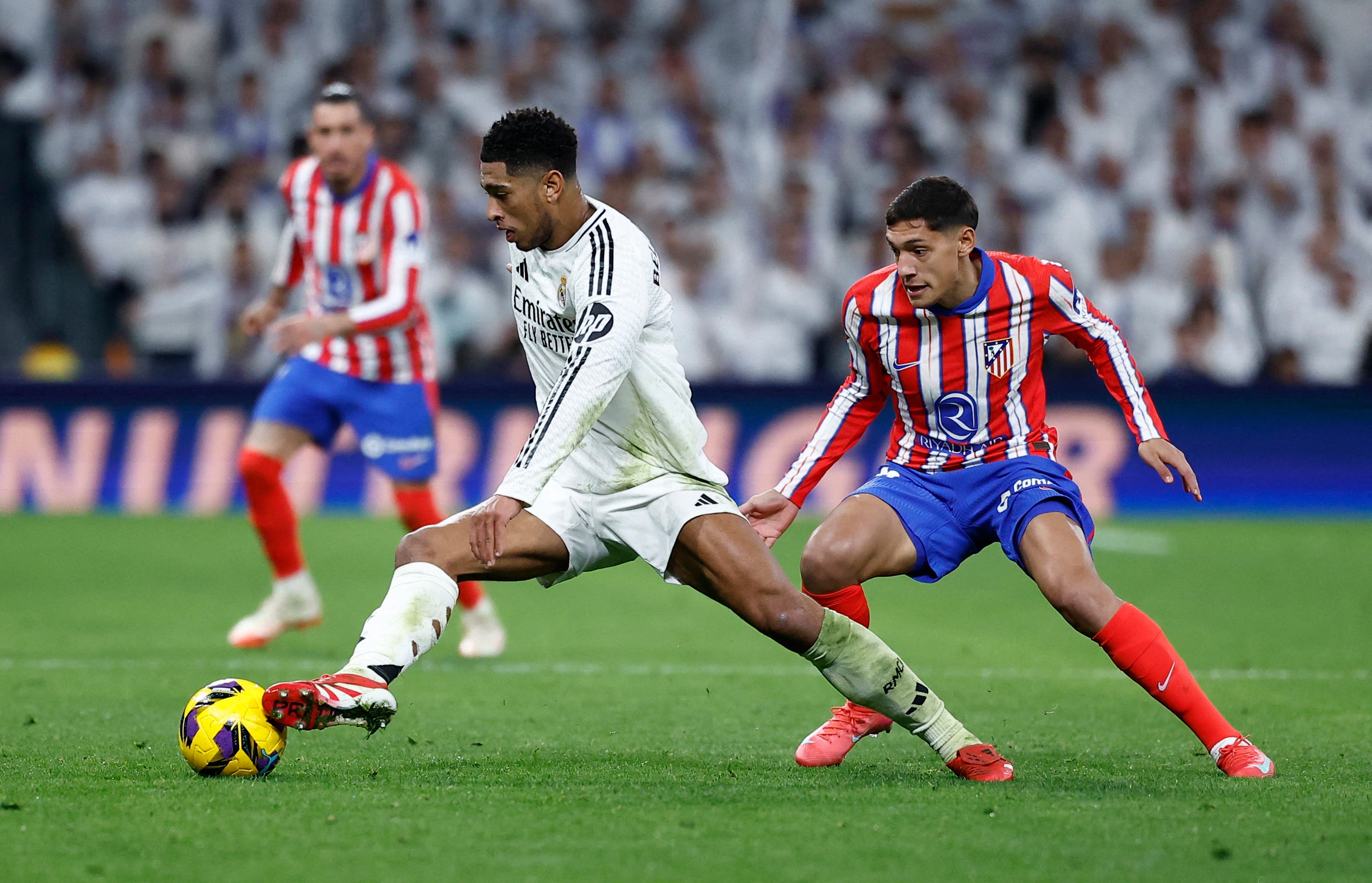 Jude Bellingham and Nahuel Molina in Real Madrid vs. Atletico Madrid La Liga match. 