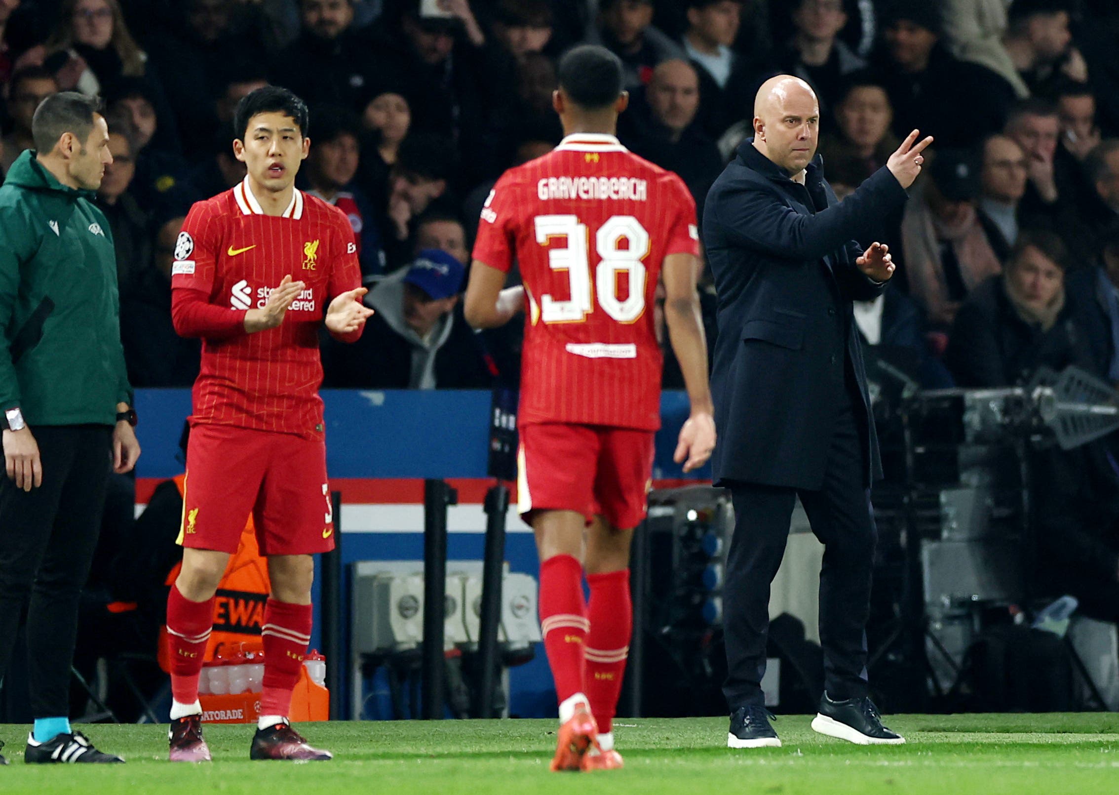 Liverpool's Wataru Endo comes on as a substitute to replace Ryan Gravenberch as manager Arne Slot looks 