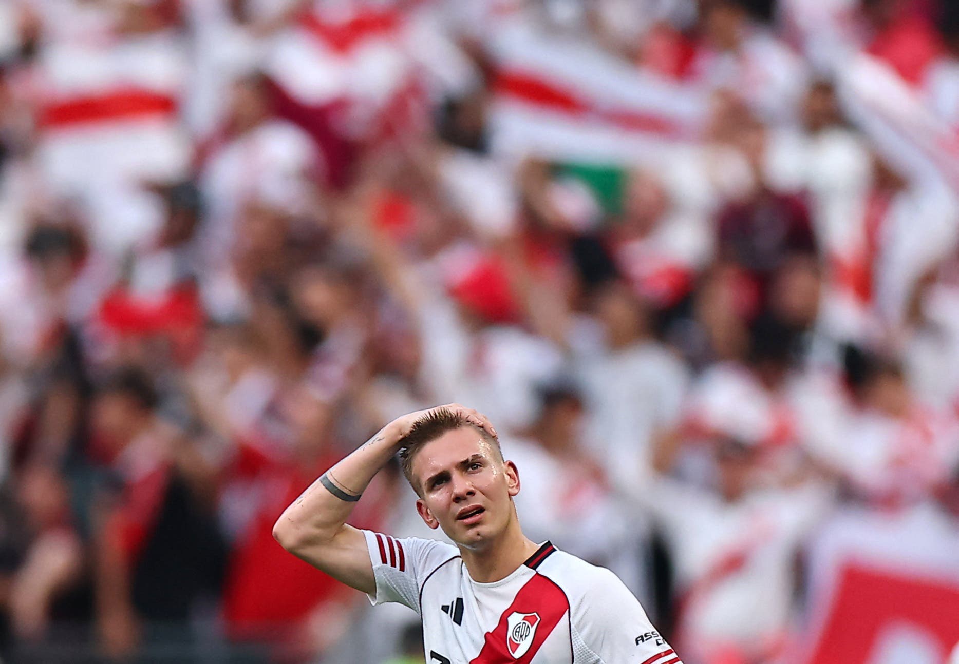 River Plate's Franco Mastantuono looks dejected after the match 