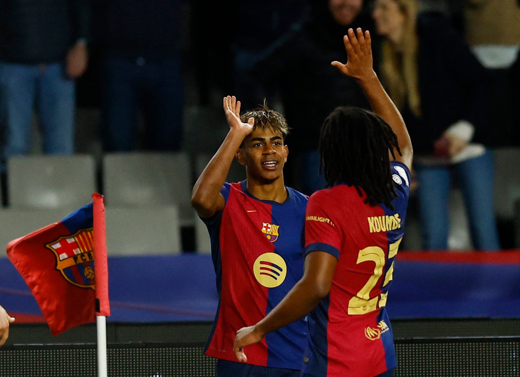 FC Barcelona's Lamine Yamal celebrates with Jules Kounde 