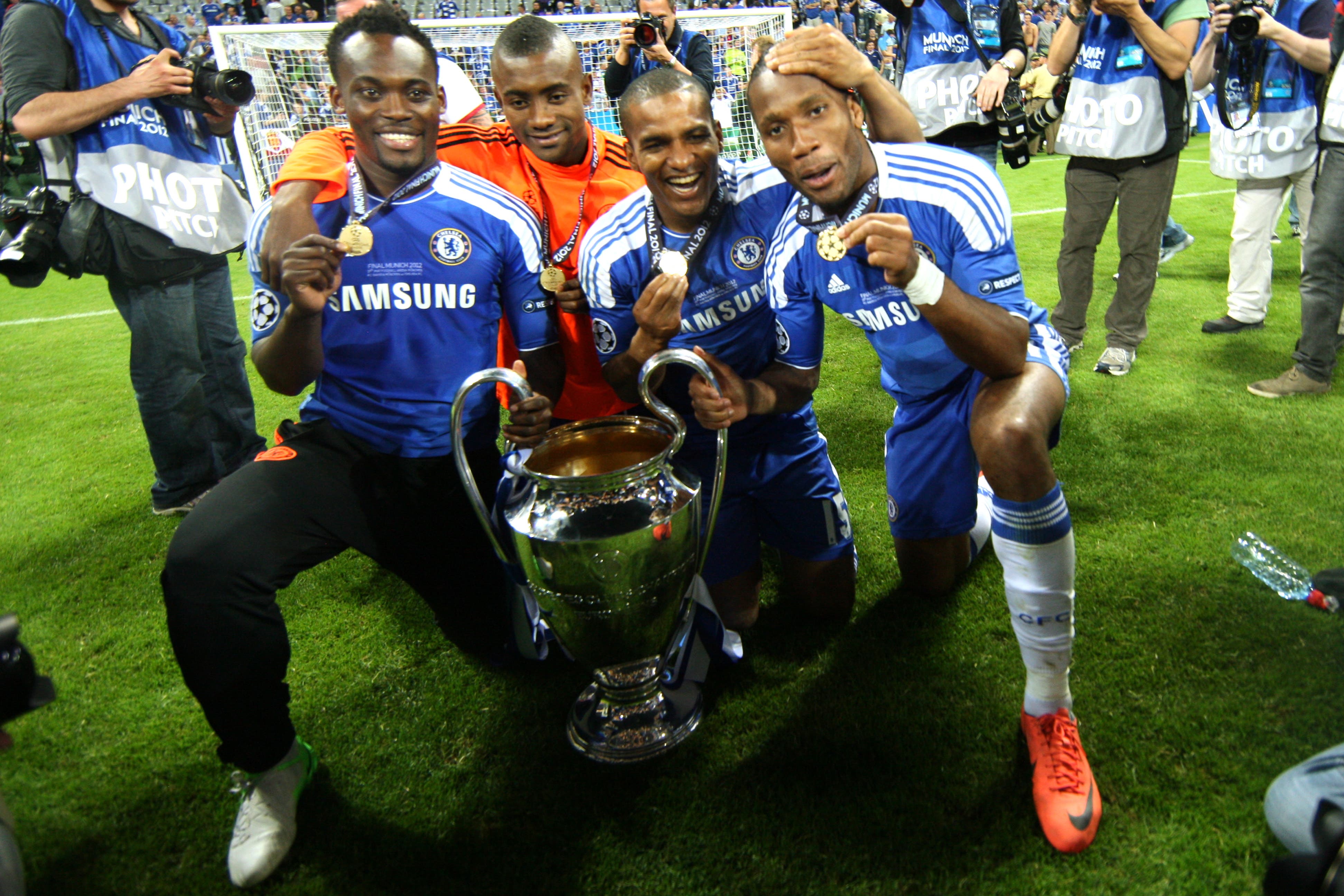 Football - Bayern Munich v Chelsea - 2012 UEFA Champions League Final - Allianz Arena, Munich, Germany - 11/12 , 19/5/12 Chelsea's Michael Essien, Florent Malouda and Didier Drogba celebrate victory with the trophy Mandatory Credit: Action Images / Lee Smith