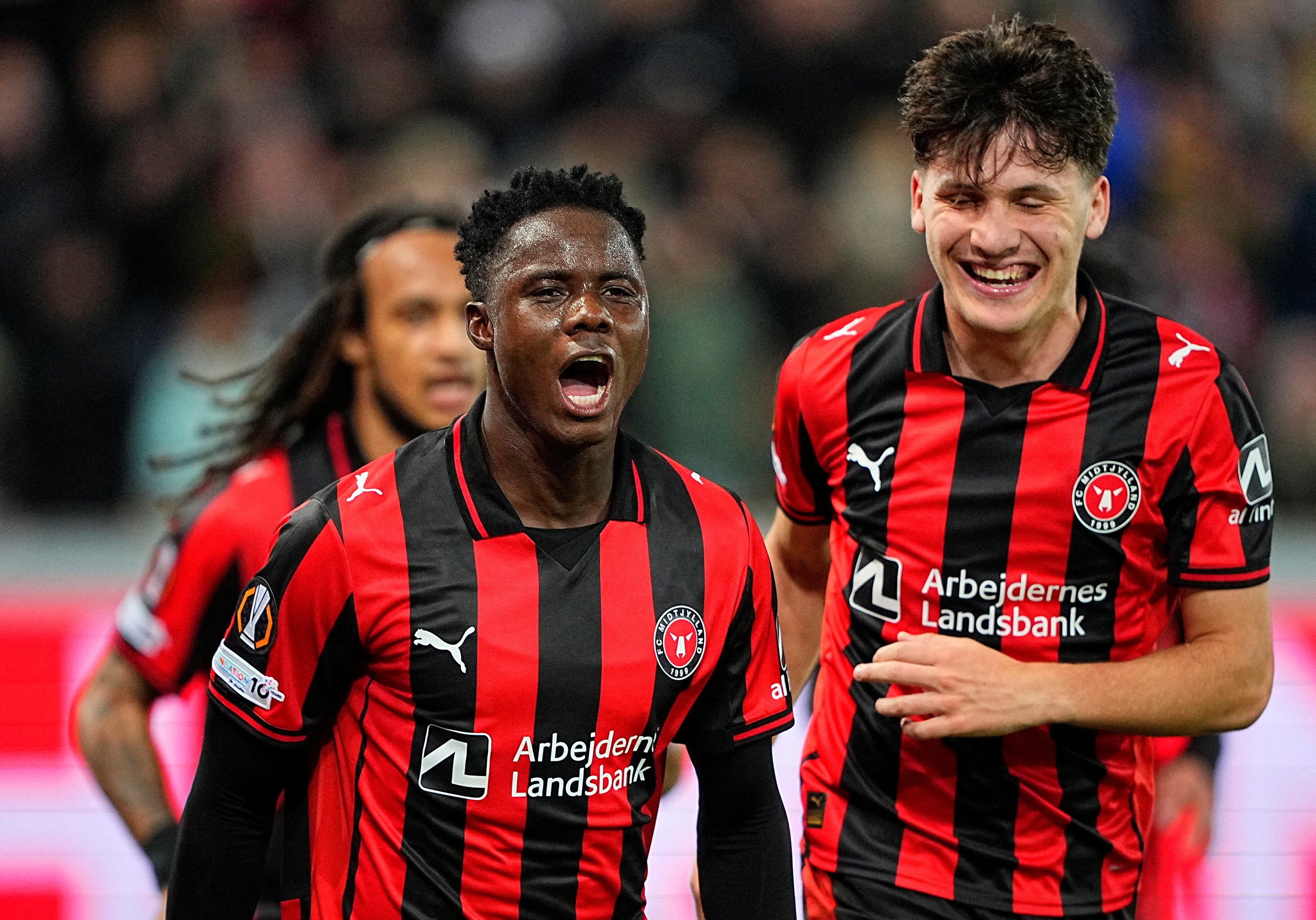 Soccer Football - UEFA Europa League - FC Midtjylland v Celtic - MCH Arena, Herning, Denmark - November 6, 2025 FC Midtjylland's Franculino Dju celebrates scoring their third goal with teammates. Bo Amstrup/Ritzau Scanpix via REUTERS ATTENTION EDITORS - THIS IMAGE WAS PROVIDED BY A THIRD PARTY. DENMARK OUT. NO COMMERCIAL OR EDITORIAL SALES IN DENMARK.