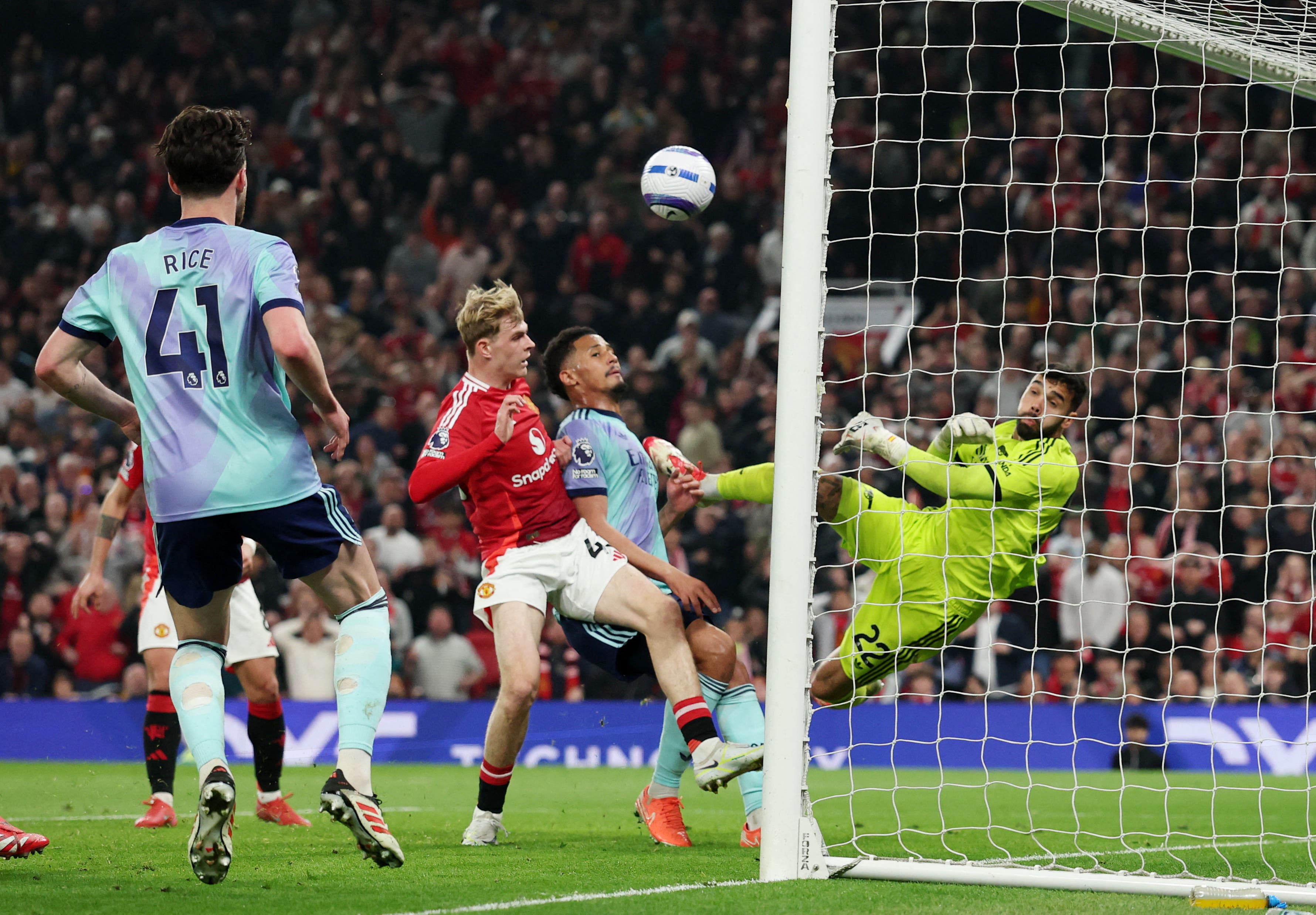 Arsenal's David Raya makes a save 