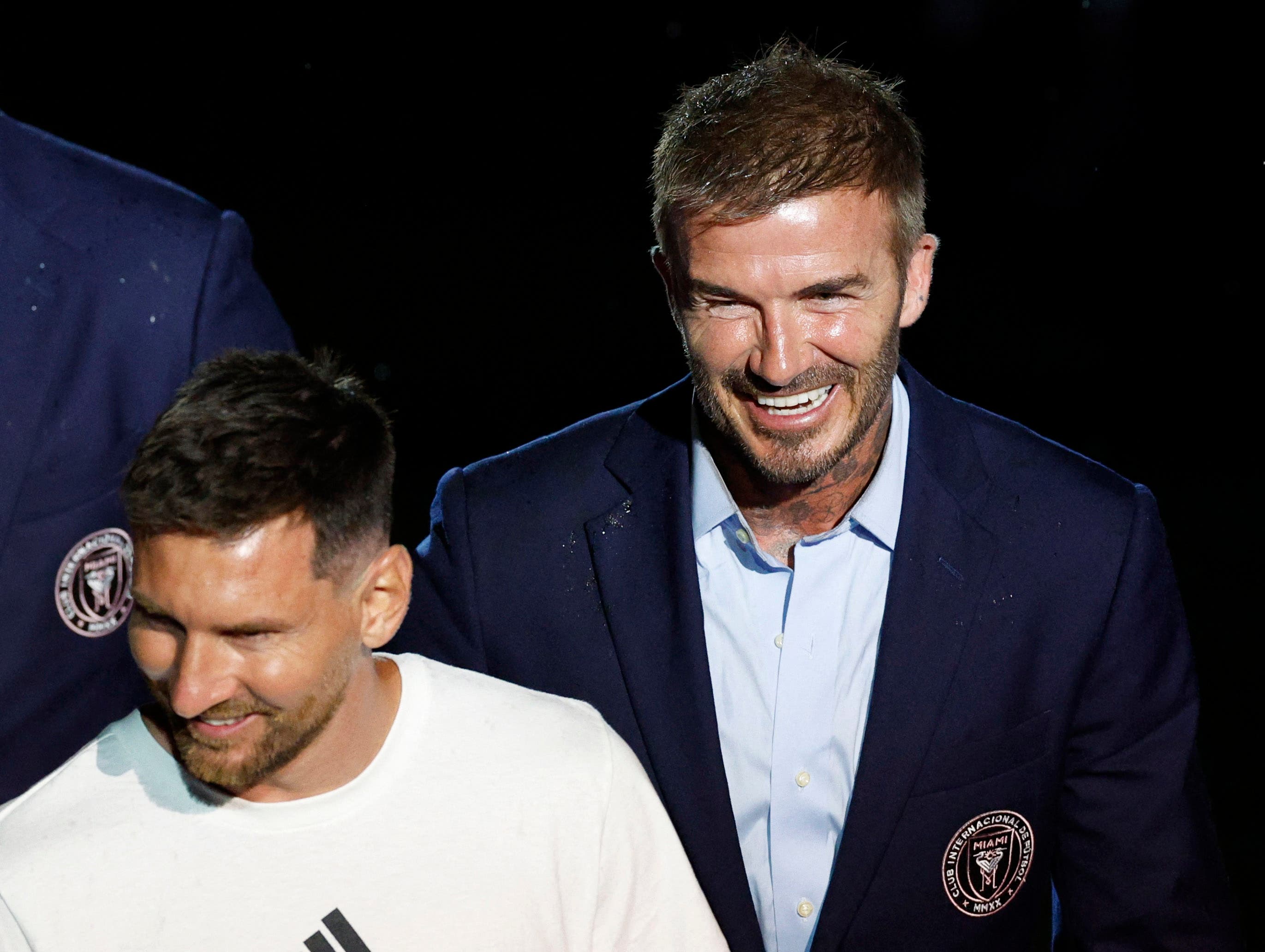  New Inter Miami signing Lionel Messi with owner David Beckham during the unveiling 