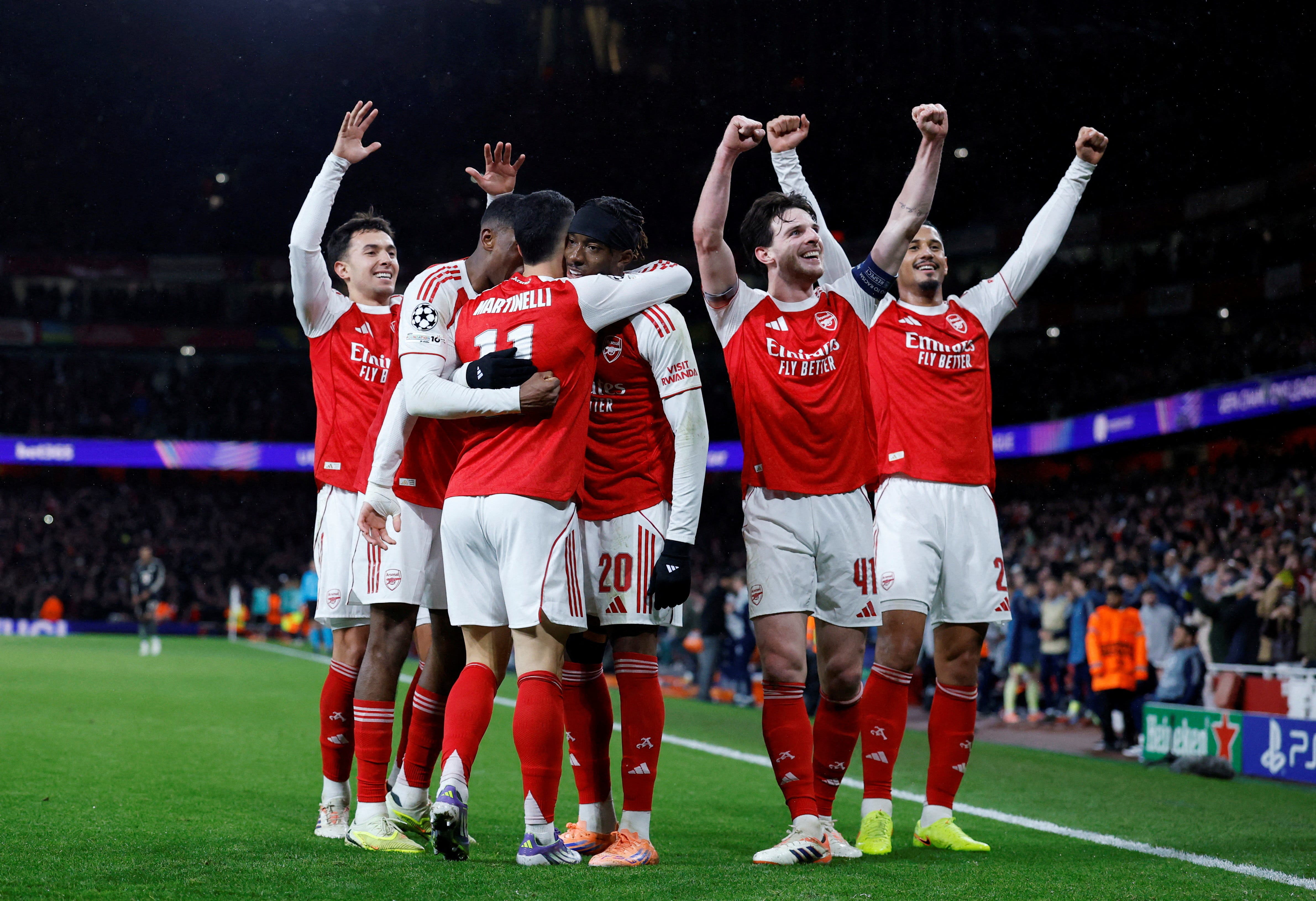 Soccer Football - UEFA Champions League - Arsenal v Bayern Munich - Emirates Stadium, London, Britain - November 26, 2025 Arsenal's Gabriel Martinelli celebrates scoring their third goal with teammates Action Images via Reuters/Peter Cziborra TPX IMAGES OF THE DAY