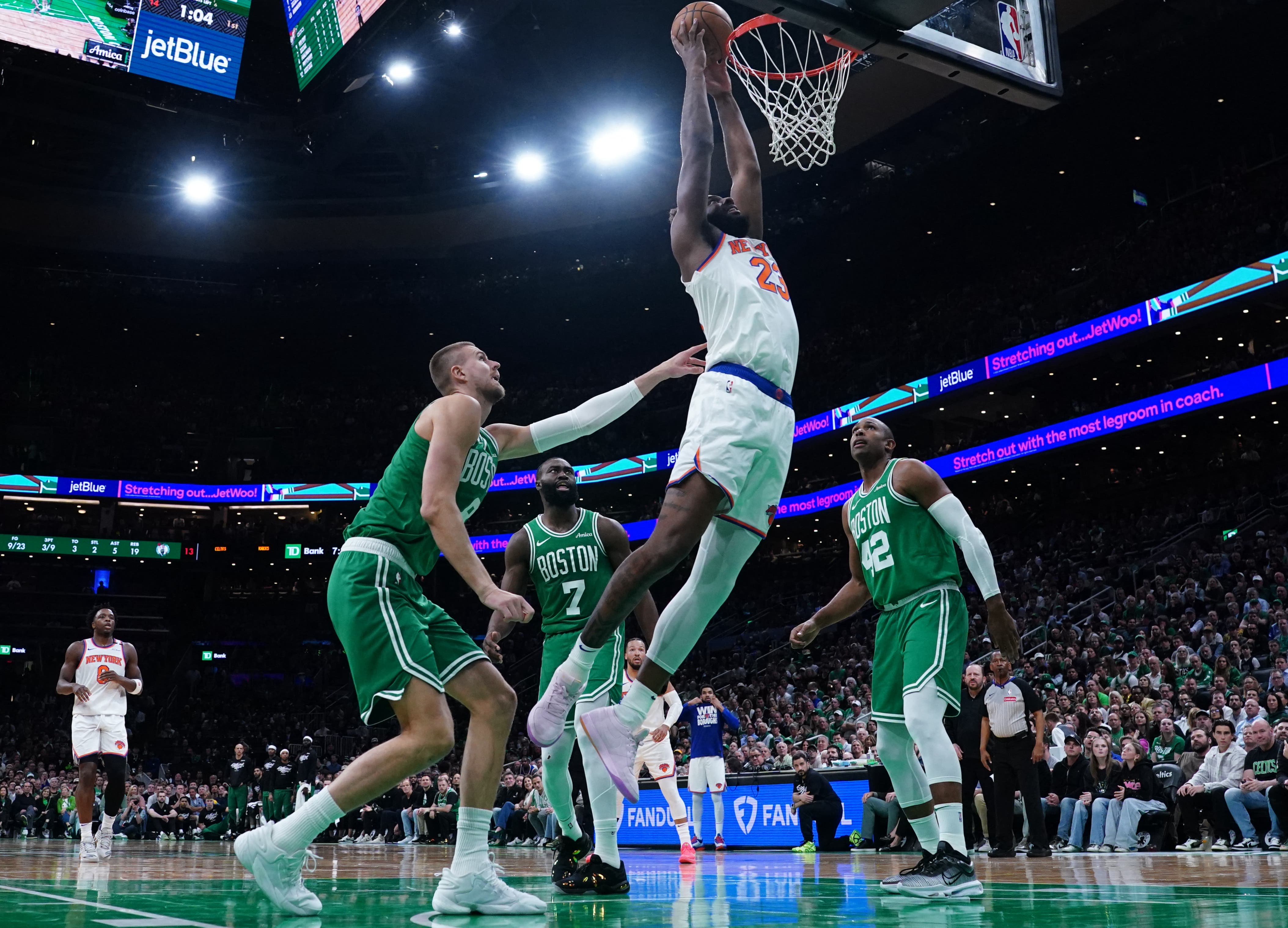 New York Knicks' Mitchell Robinson scoring points against Boston Celtics in Game 2.