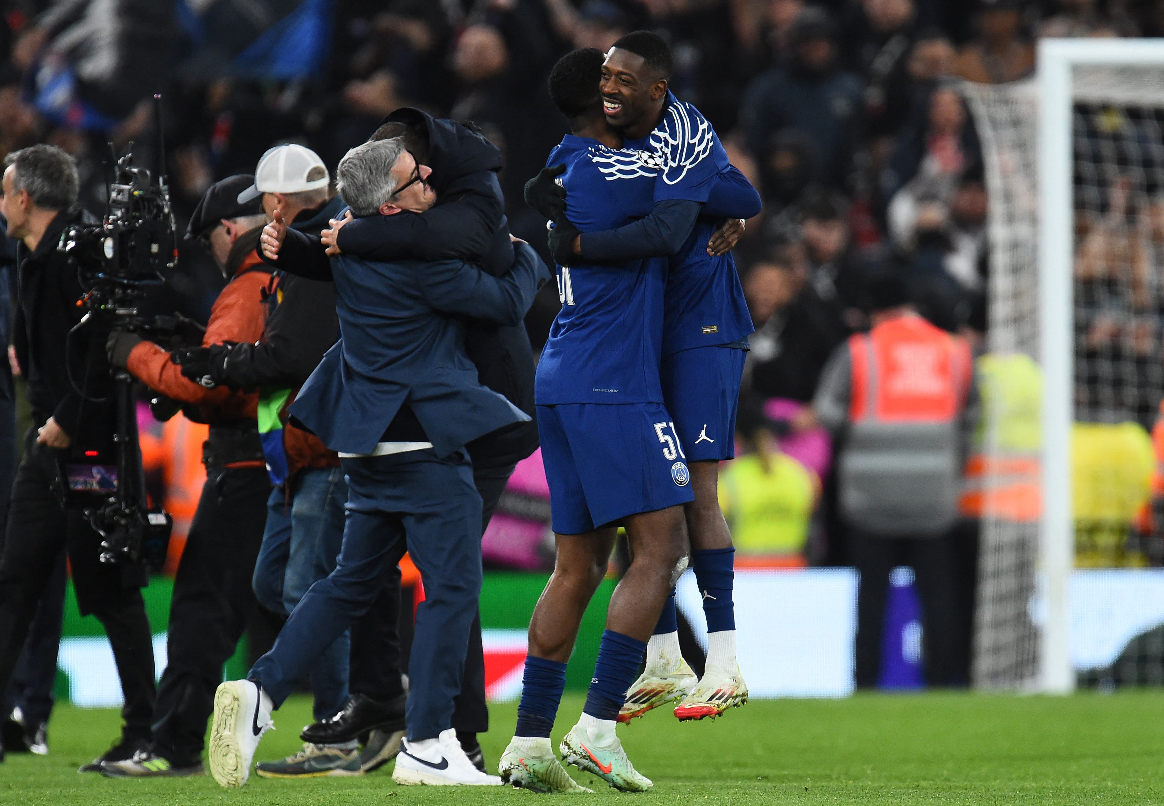 Paris St Germain's Willian Pacho and Ousmane Dembele celebrate after the match