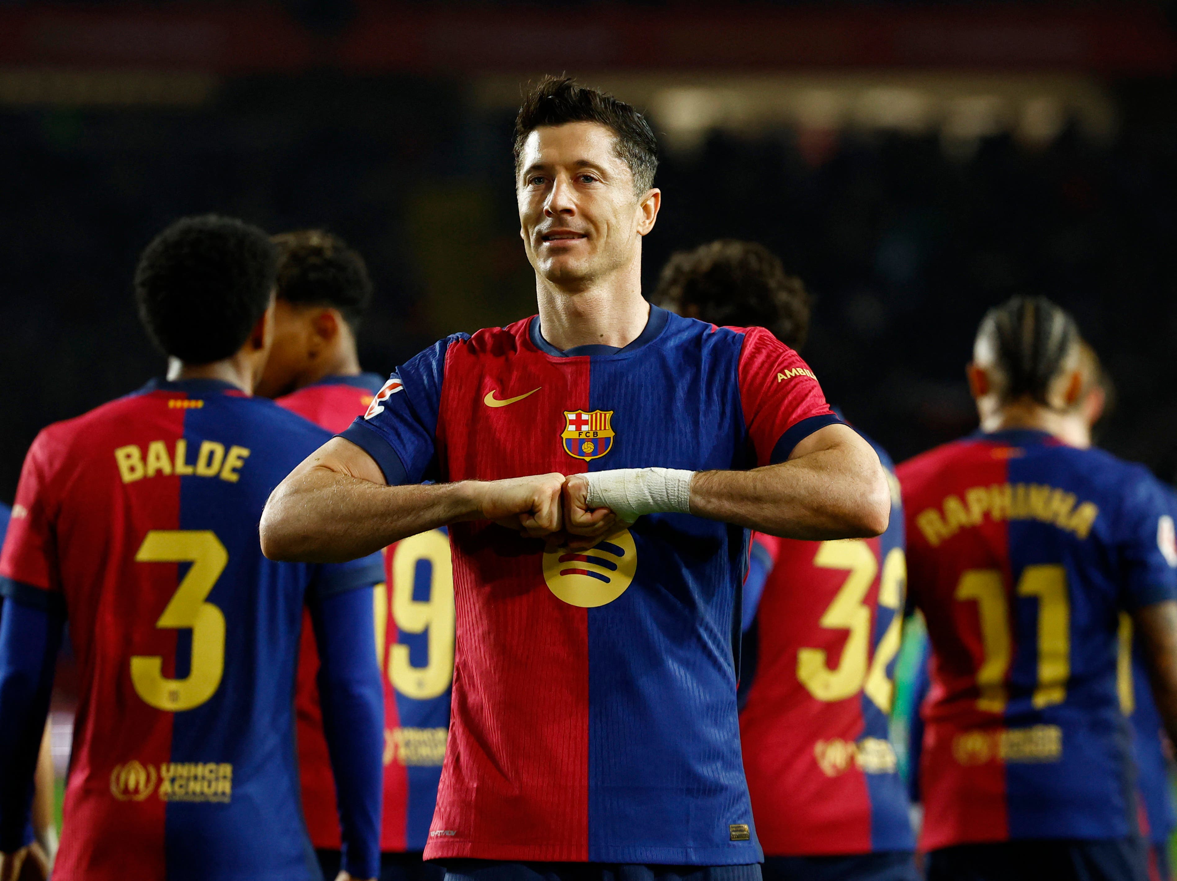 Barcelona's Robert Lewandowski celebrates scoring their first goal