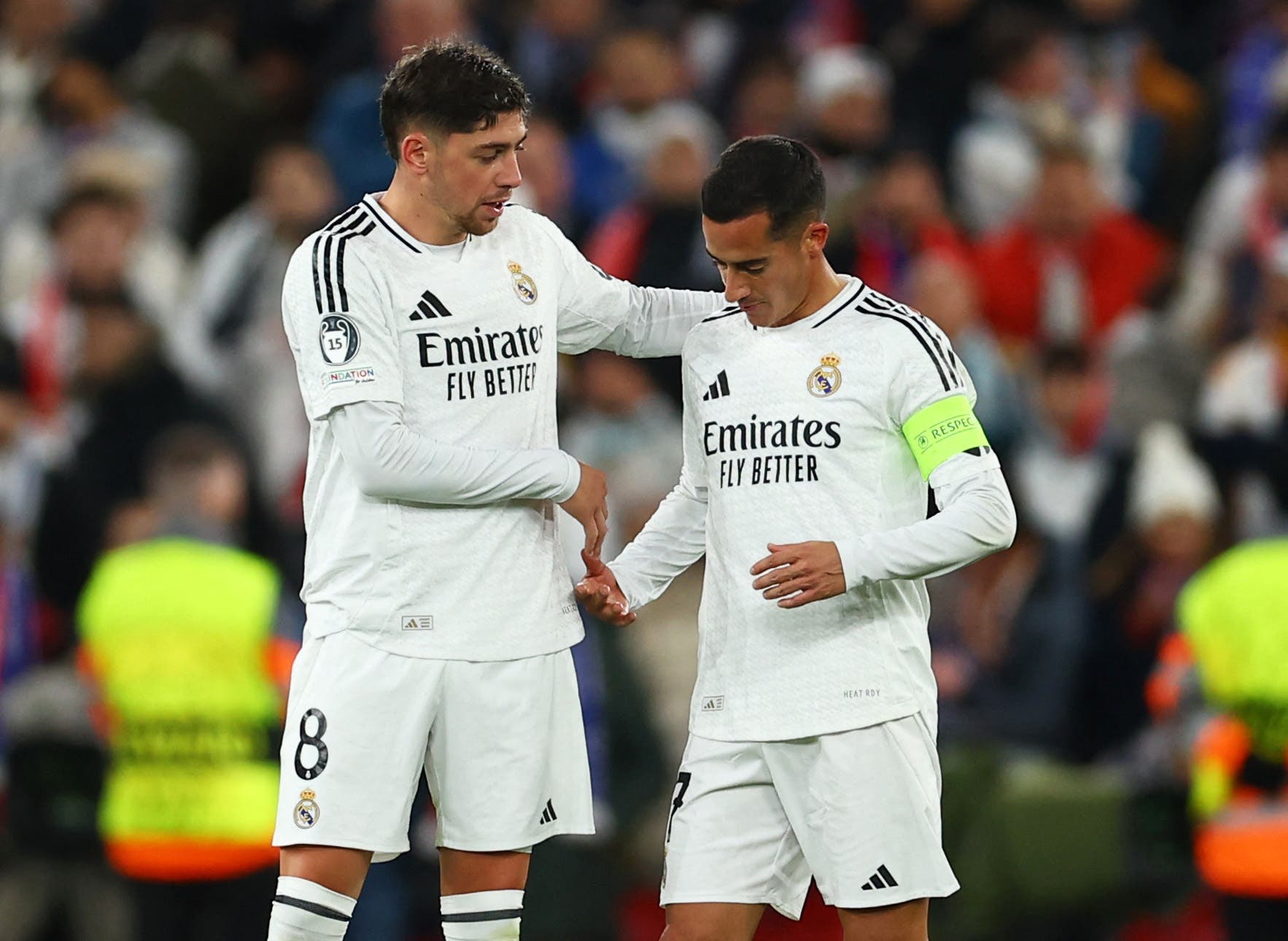 Real Madrid's Federico Valverde and Lucas Vazquez look dejected after the match 