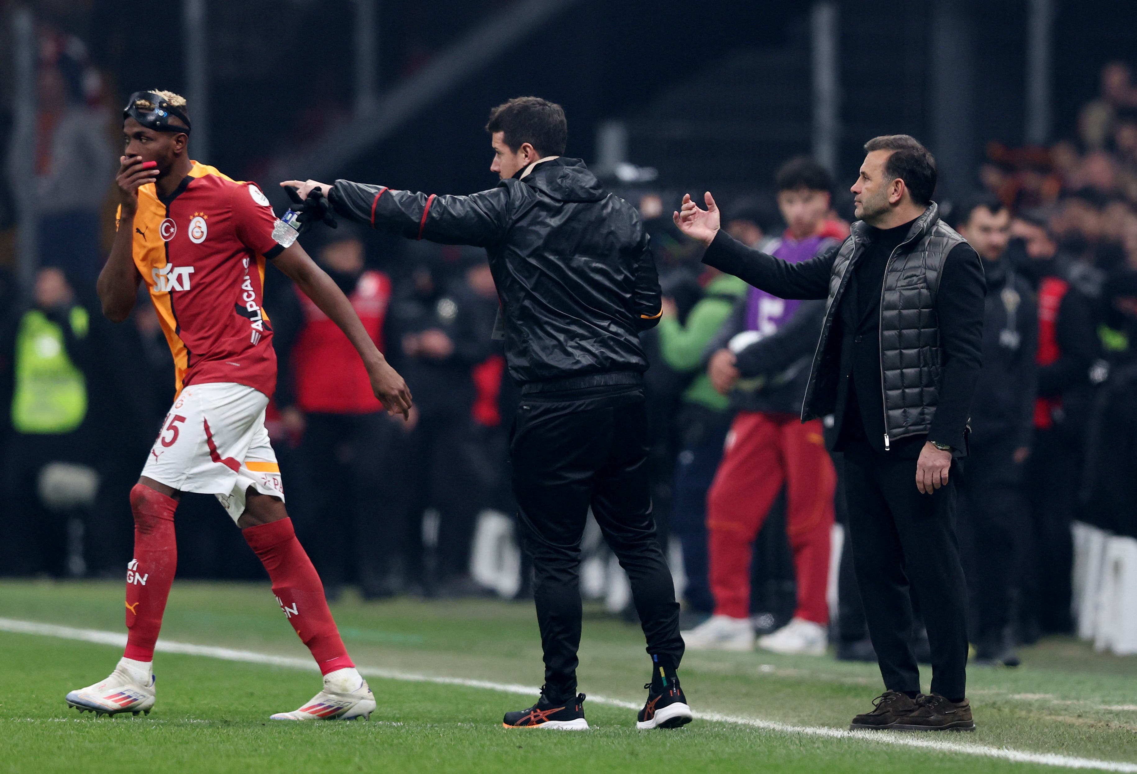 Galatasaray coach Okan Buruk gives directions to Galatasaray's Victor Osimhen