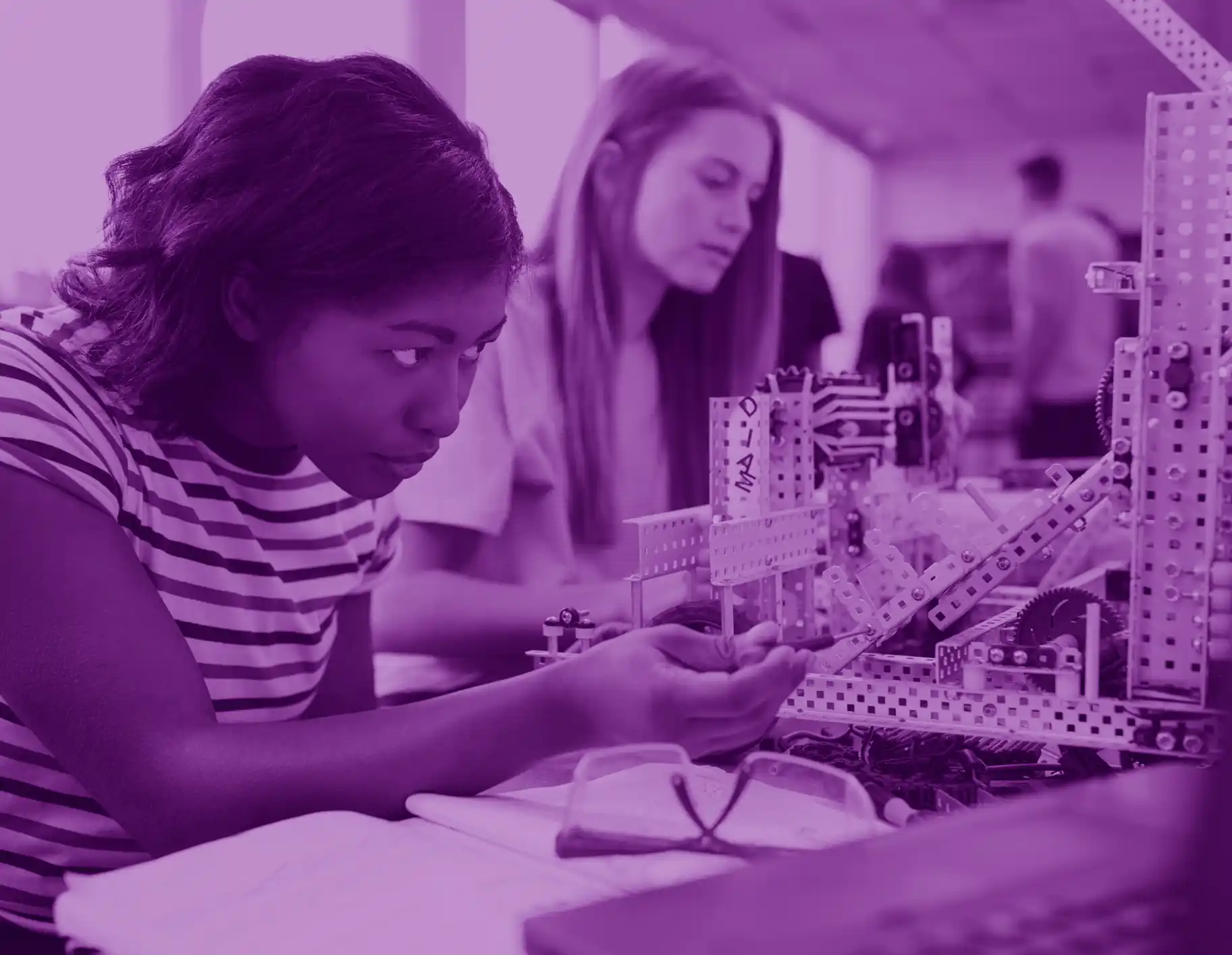 Female engineering students in a workshop classroom