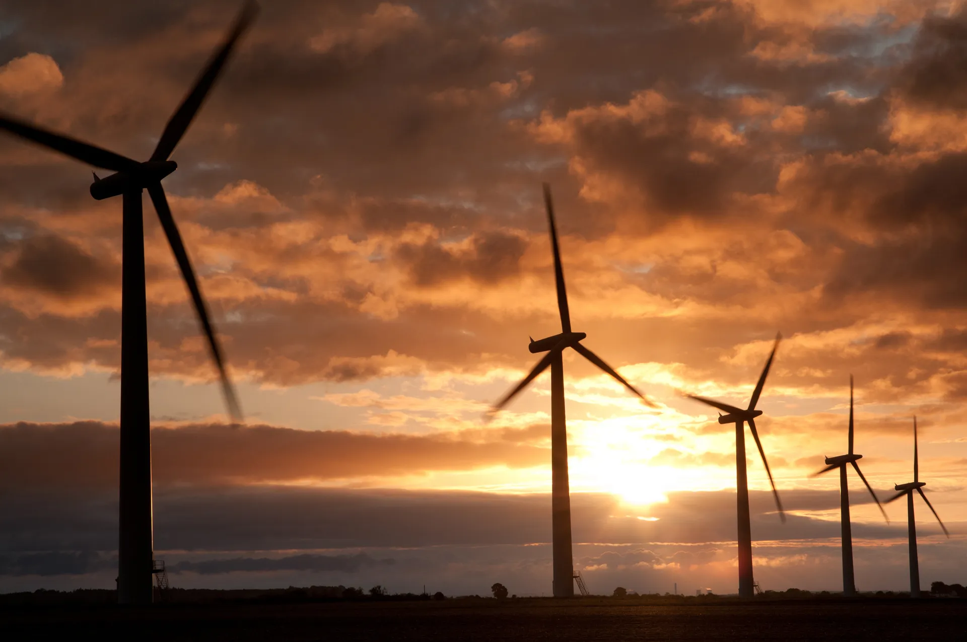 Wind power being generated during sunset