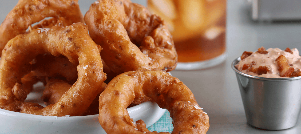Bacon Onion Rings with Chipotle Crema