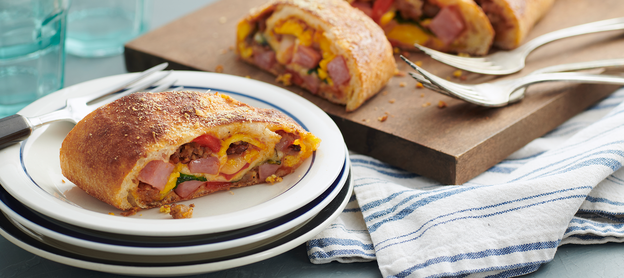 Ham and Sausage Breakfast Stromboli with Roasted Peppers and Spinach