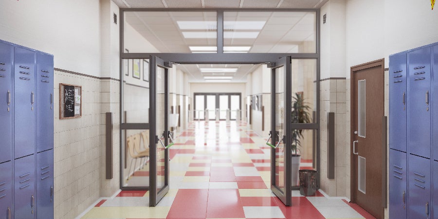 School hallway with lockers and open doors