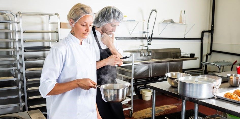 Kitchen staff in a commercial kitchen