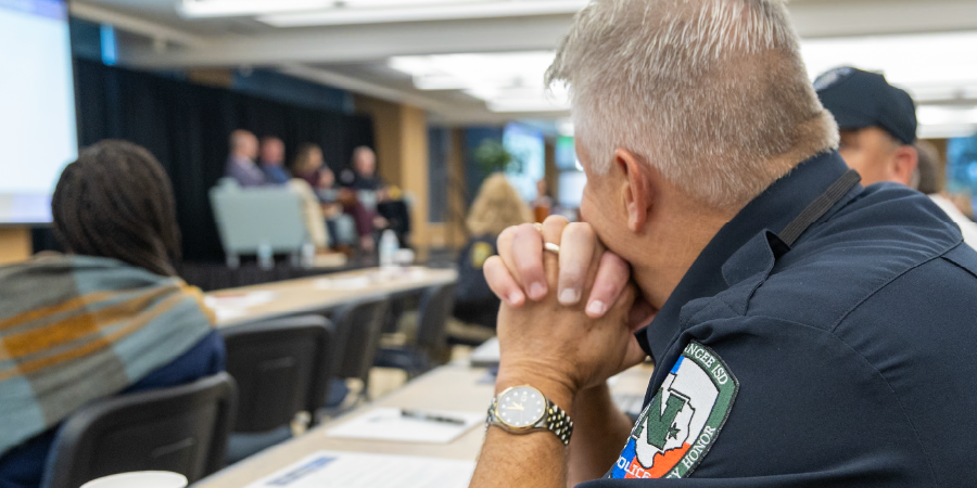 photo of a police officer at a conference