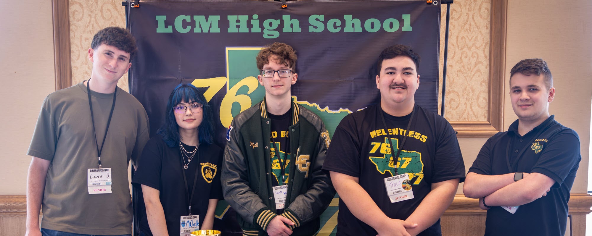 Students from Little Cypress-Mauriceville CISD proudly display their UIL computer science competition awards.