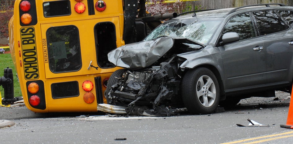 Crash between school bus and car