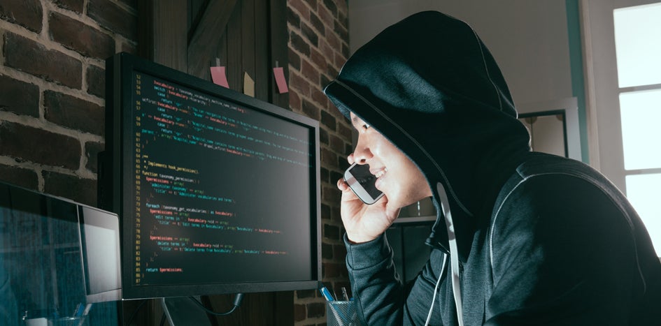 Computer hackers wearing black sweater