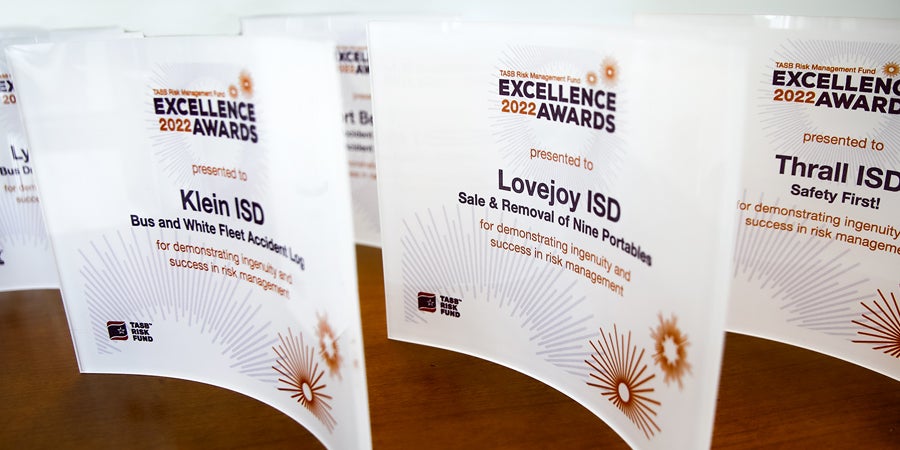 2022 Excellence Awards sit on desk
